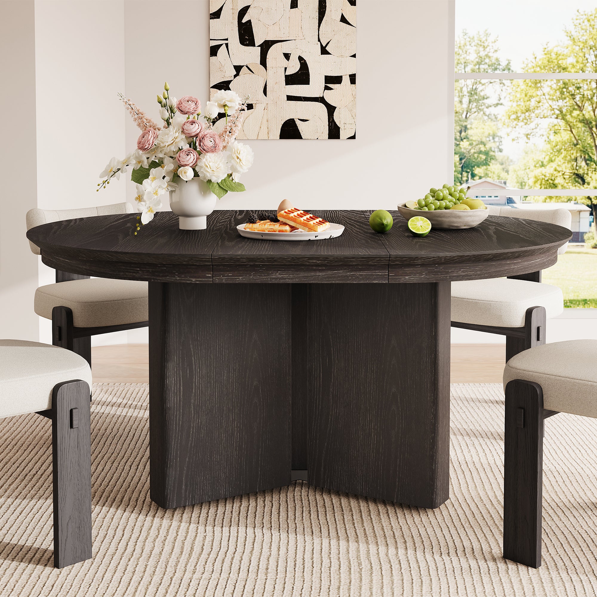 Front view of the extended oval espresso table with cream chairs by a window