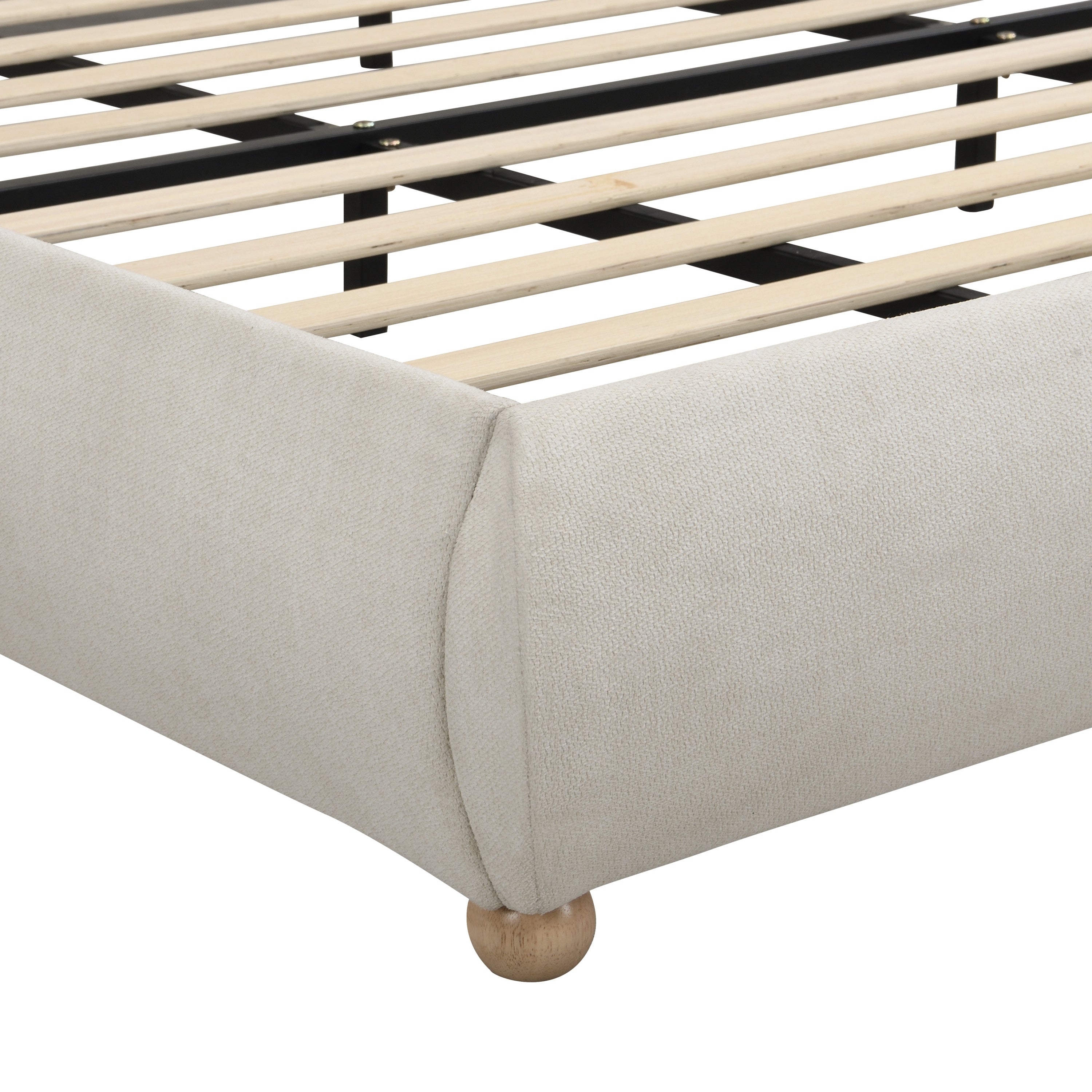 Close-up of the rounded beige chenille foot rail and round wood ball leg with wood slats #Color_Beige