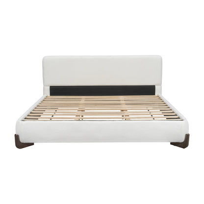 Front view of white bouclé king bed frame on white background