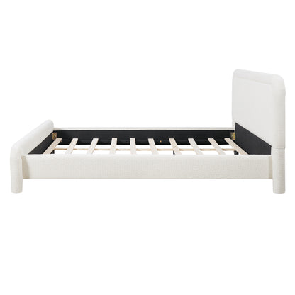 Side profile of white boucle king bed frame with slat support visible