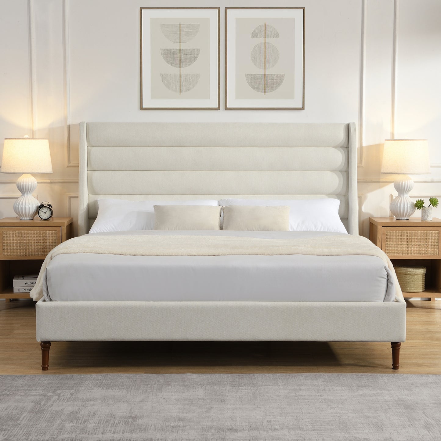 Ivory king bed with wave headboard, angled view near window