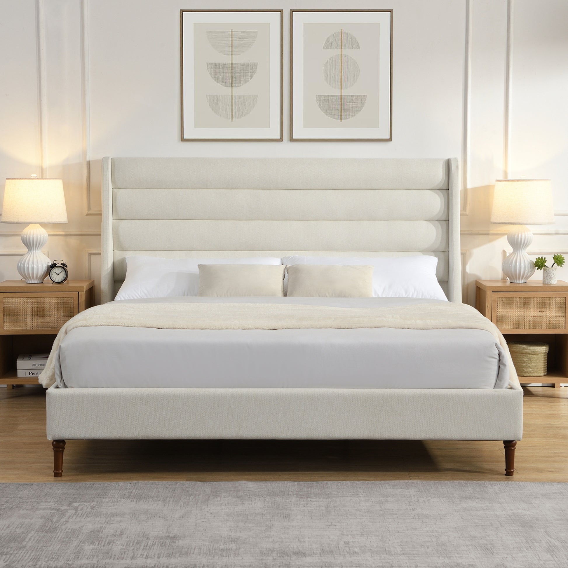 Ivory king bed with wave headboard, angled view near window