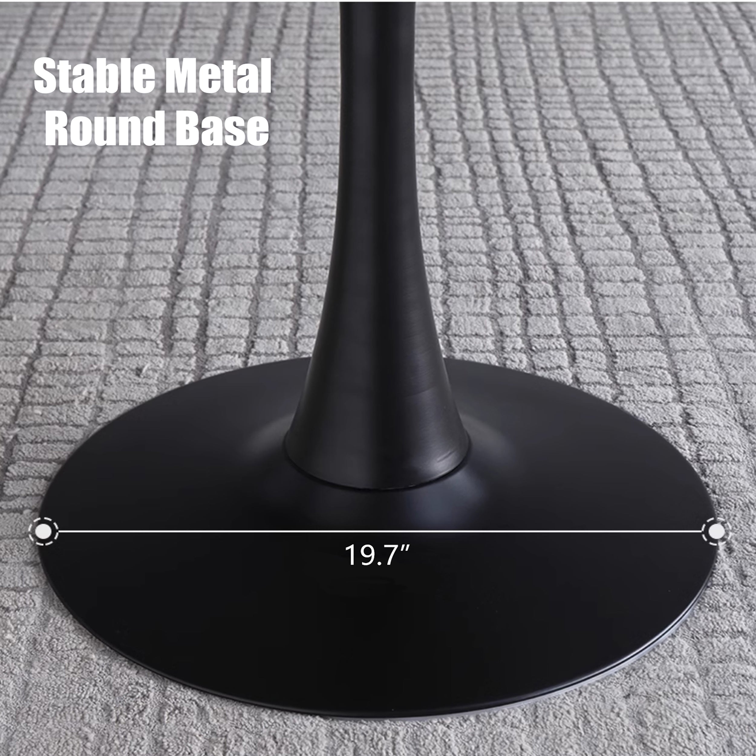 Close-up of the black metal round pedestal base labeled 19.7 inch diameter on a gray rug