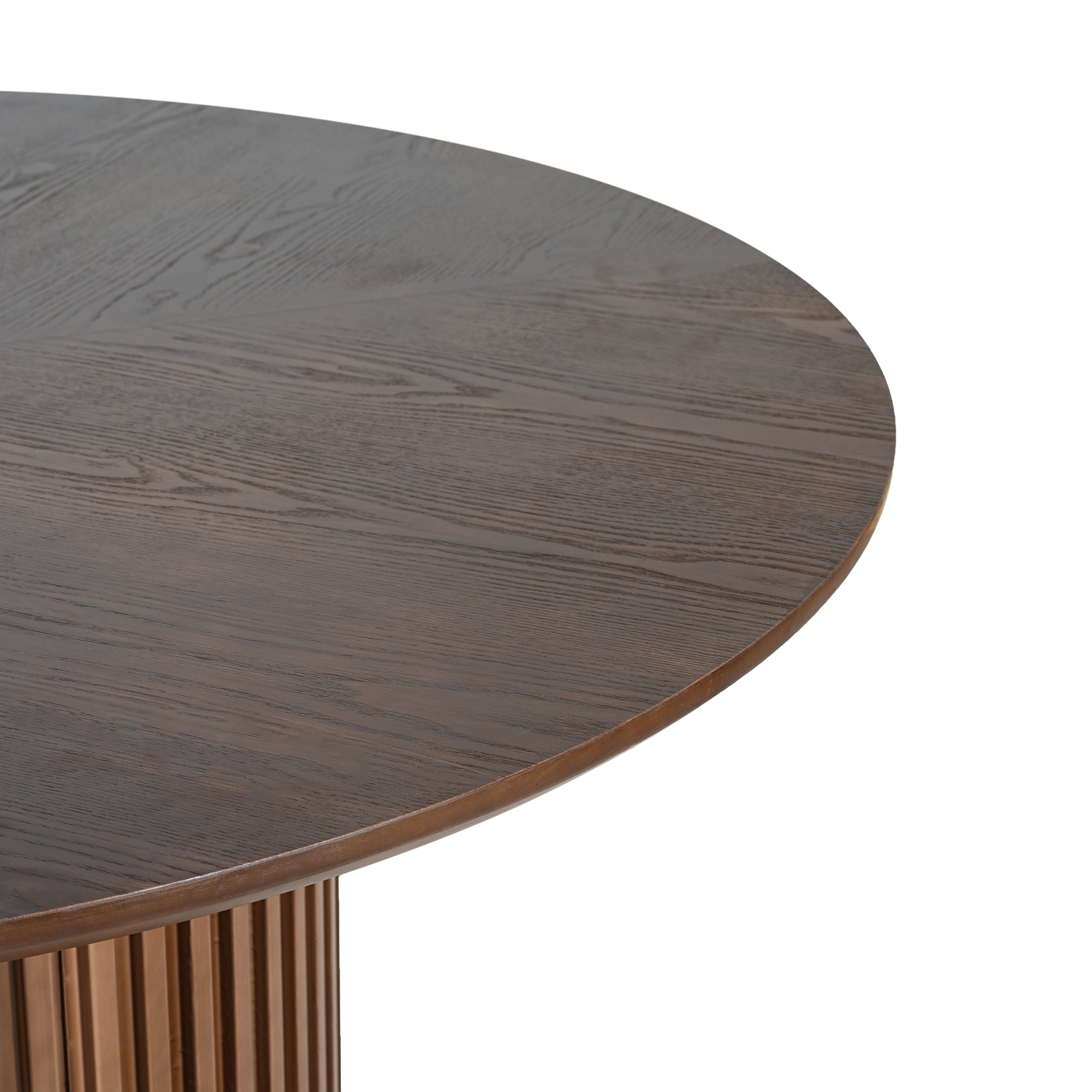 Angled close-up of the walnut round tabletop edge and grain
