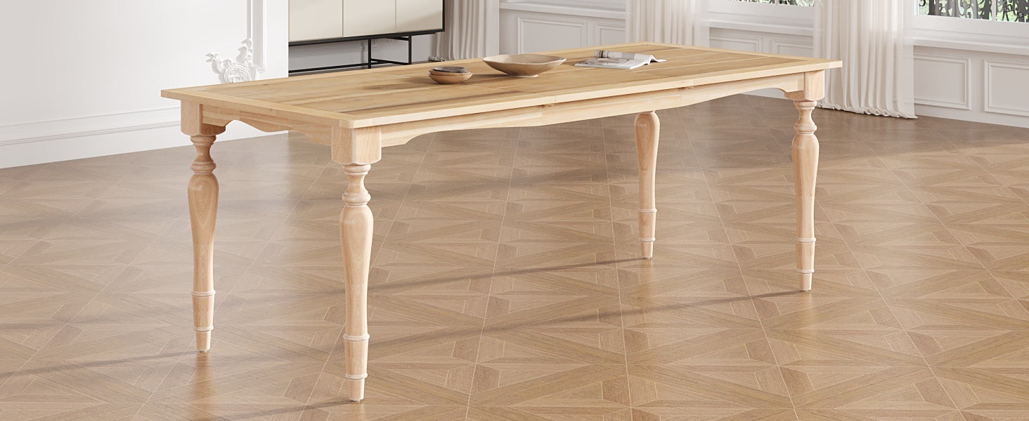 Wide angled view of the rubberwood dining table with turned legs in a bright paneled room