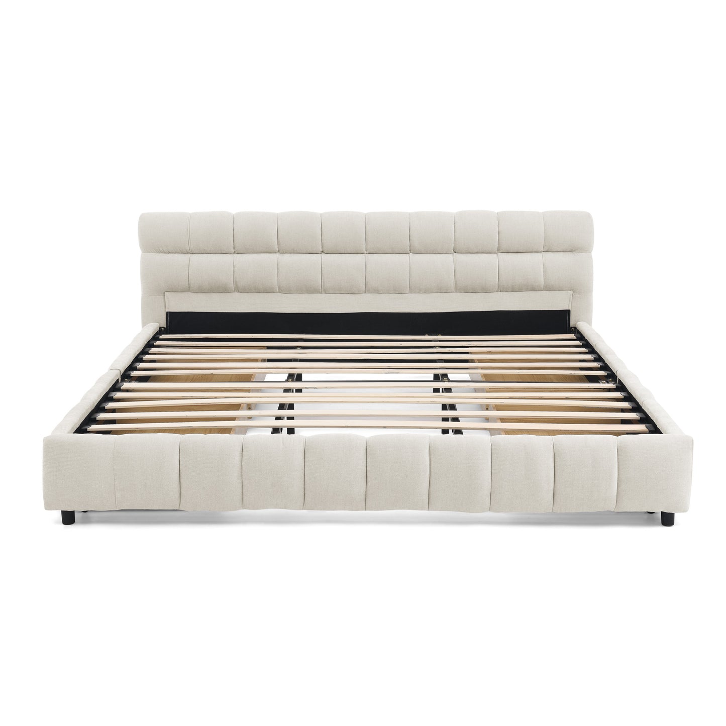 Close-up of beige tufted chenille footboard corner and leg