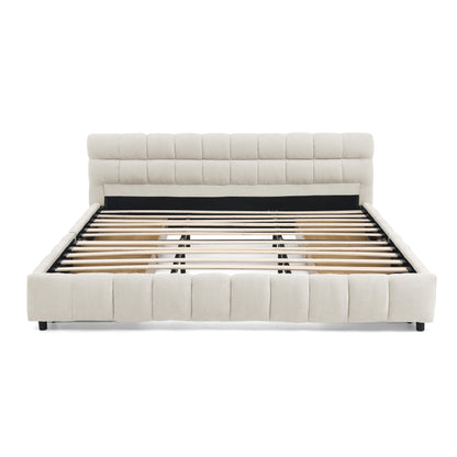 Close-up of beige tufted chenille footboard corner and leg