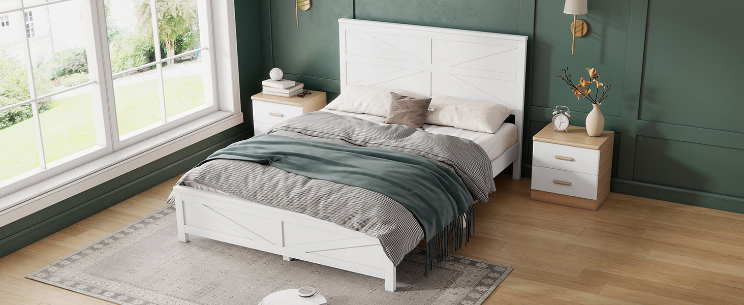 Overhead angled view of the white barn door bed styled with bedding beside a bright window