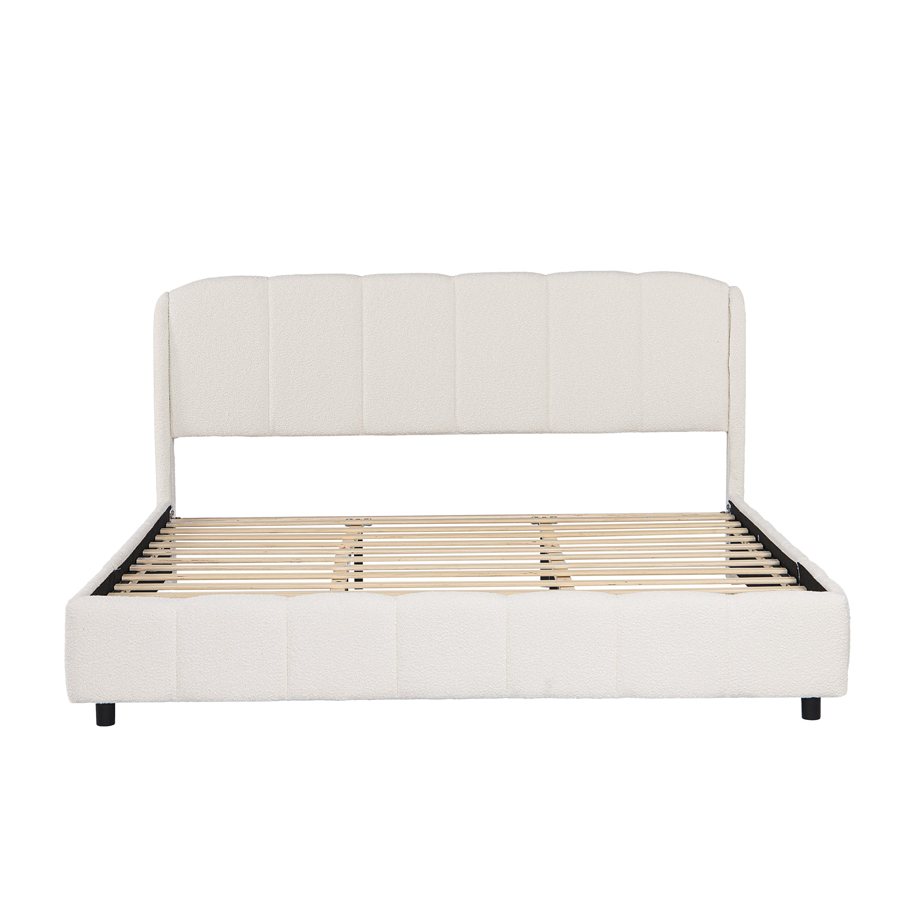 Side profile of beige bouclé king platform bed showing headboard height