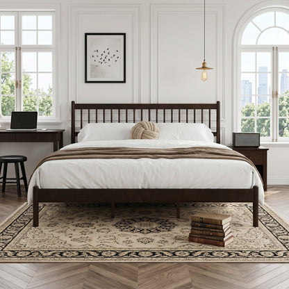 Brown pine king bed with round pillow, angled bedroom view