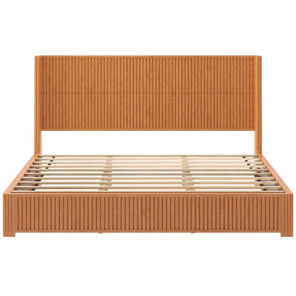 Natural wood king size floor bed frame with tall fluted headboard, front view