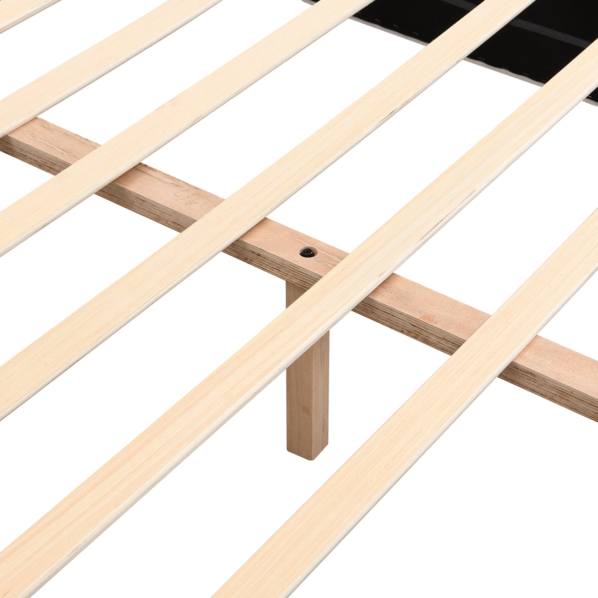 Close-up of angled wood foot on white boucle king bed frame