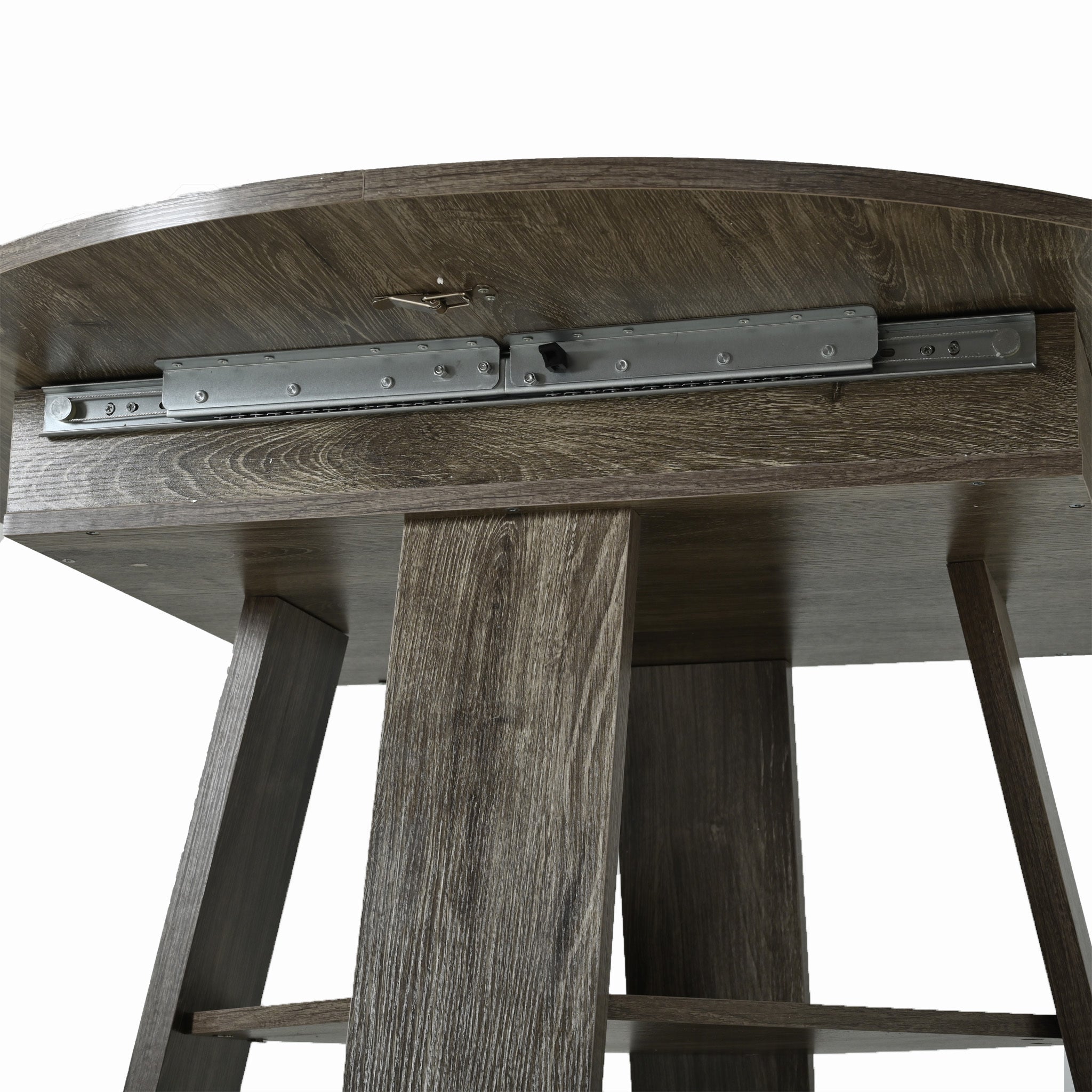 Close-up of the gray cross-shaped base and lower storage shelf
