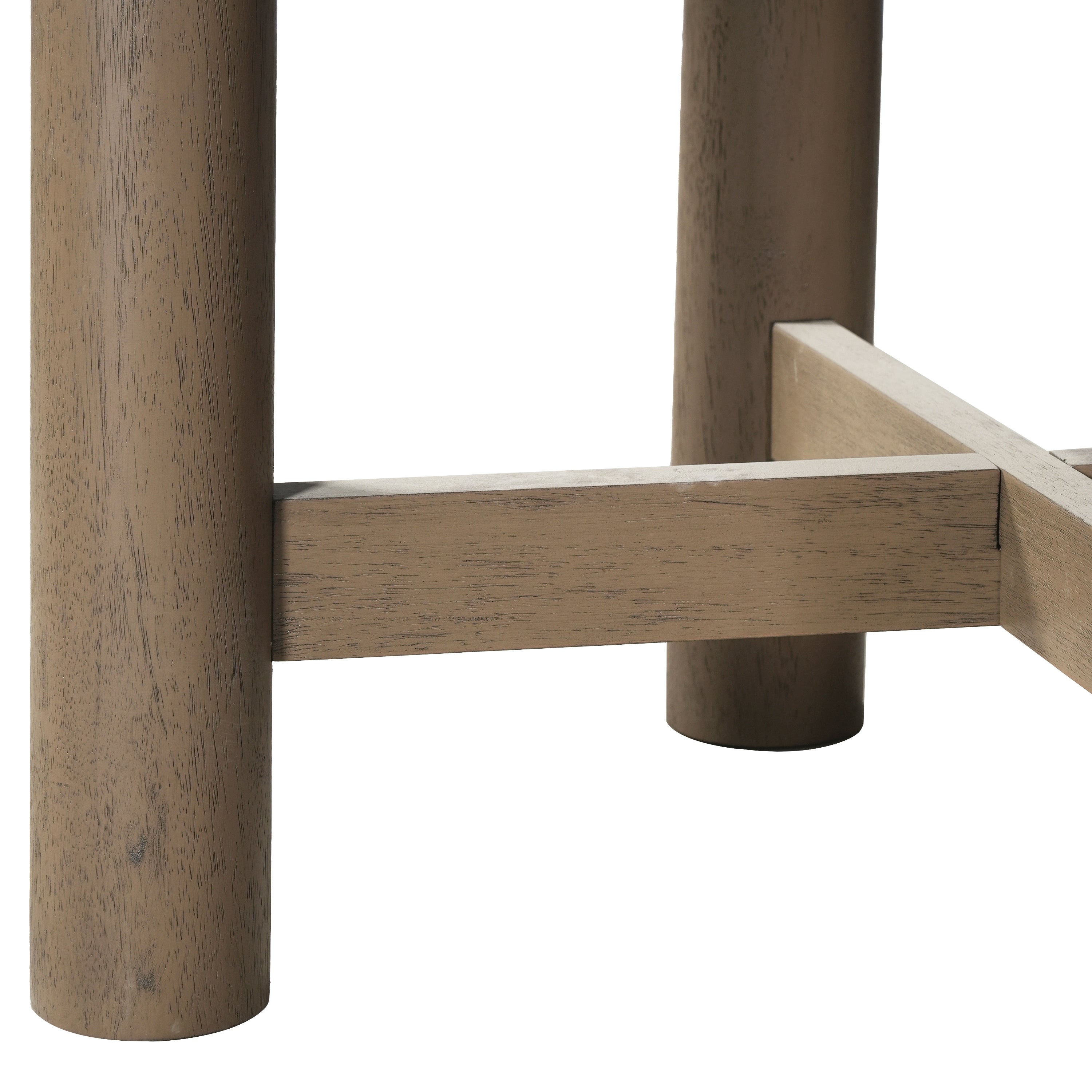 Close-up of a round oak leg meeting the X-shaped stretcher
