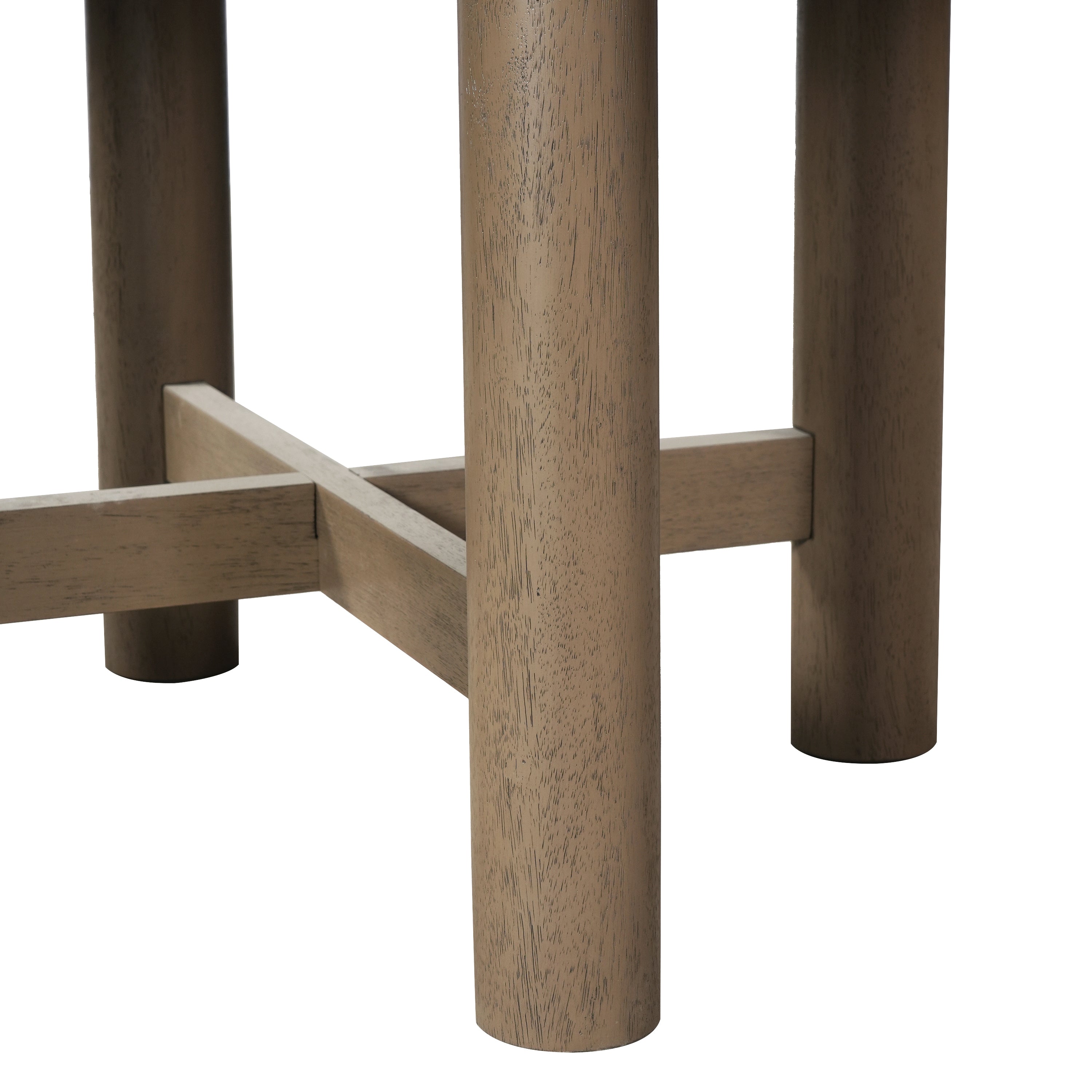 Low-angle close-up of the X-shaped stretcher joining the round legs