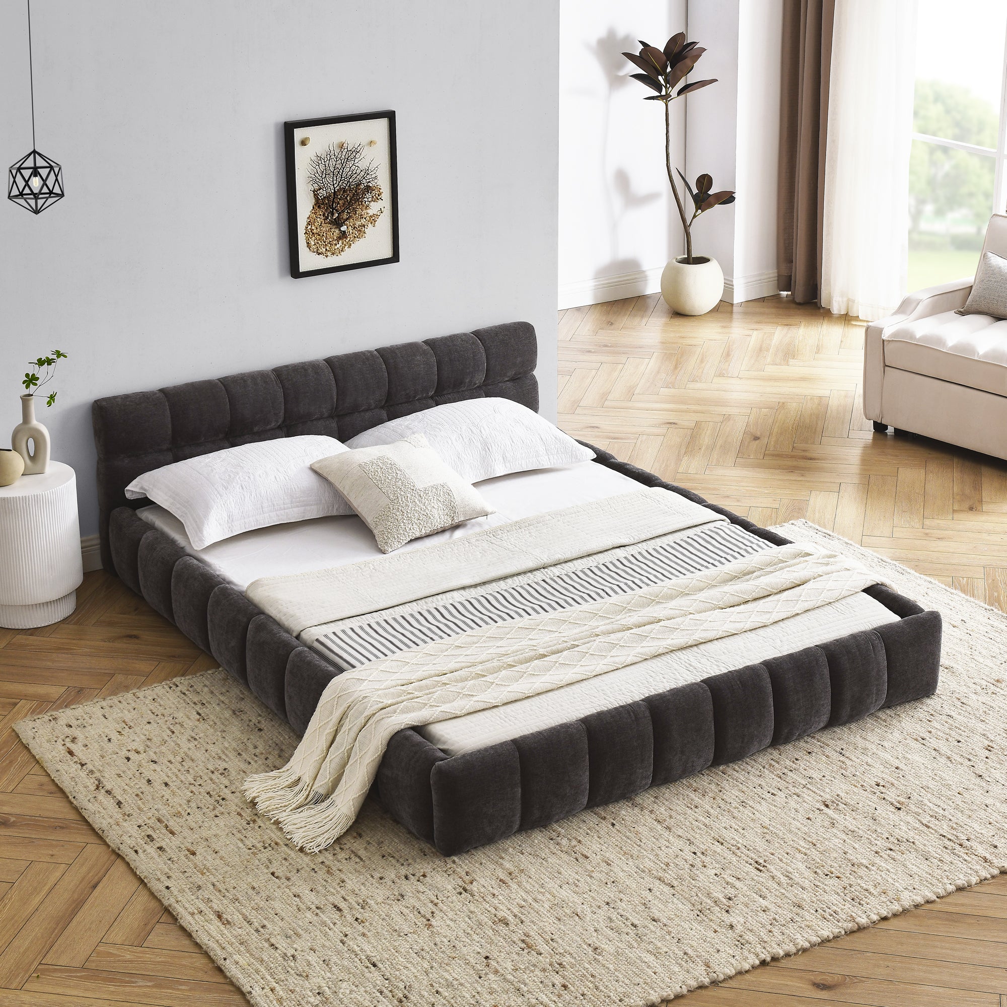 Dark grey chenille platform bed styled in a bedroom, angled foot view with white bedding #Color_Dark Grey