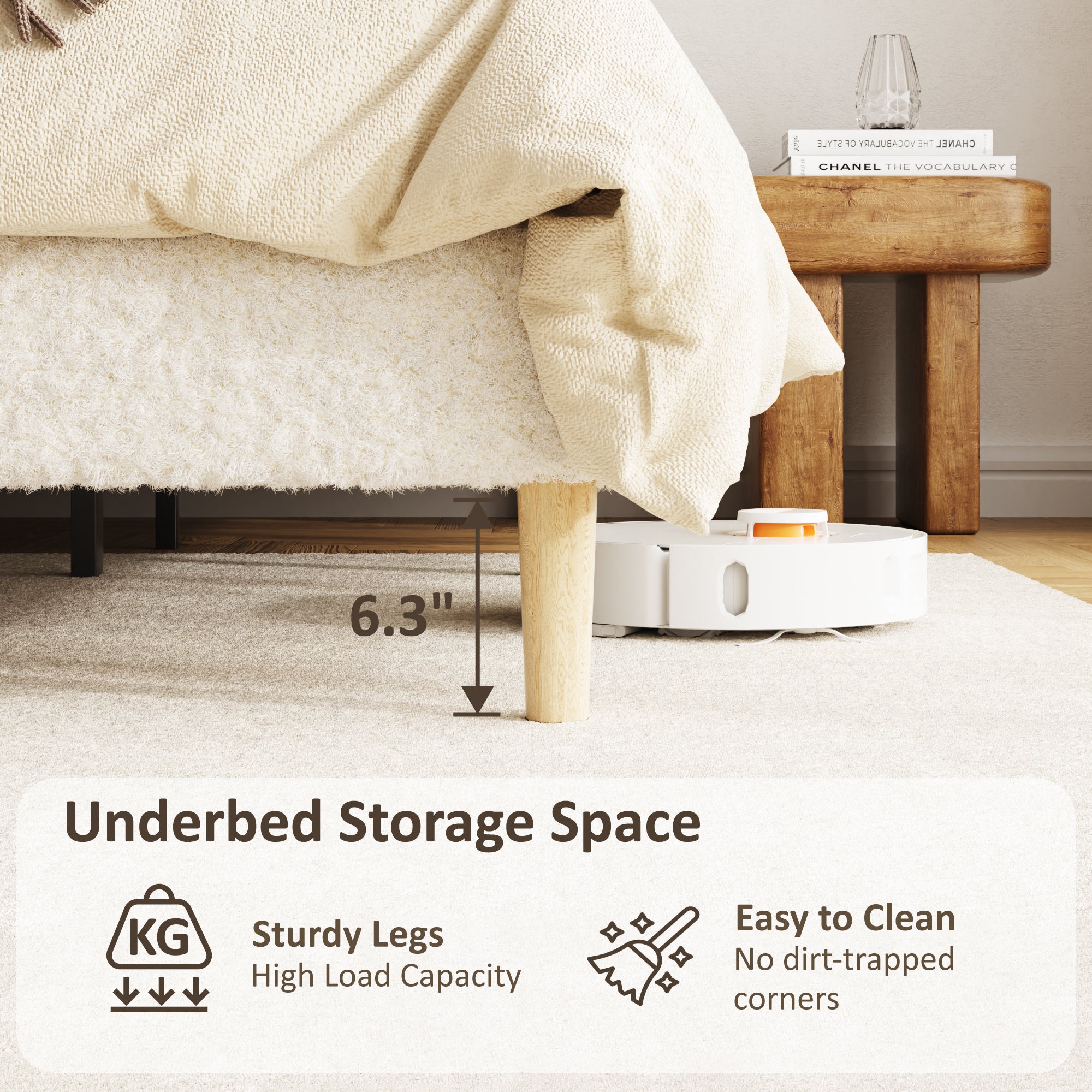 Under-bed clearance of the beige platform bed with a robot vacuum passing beneath the wood legs