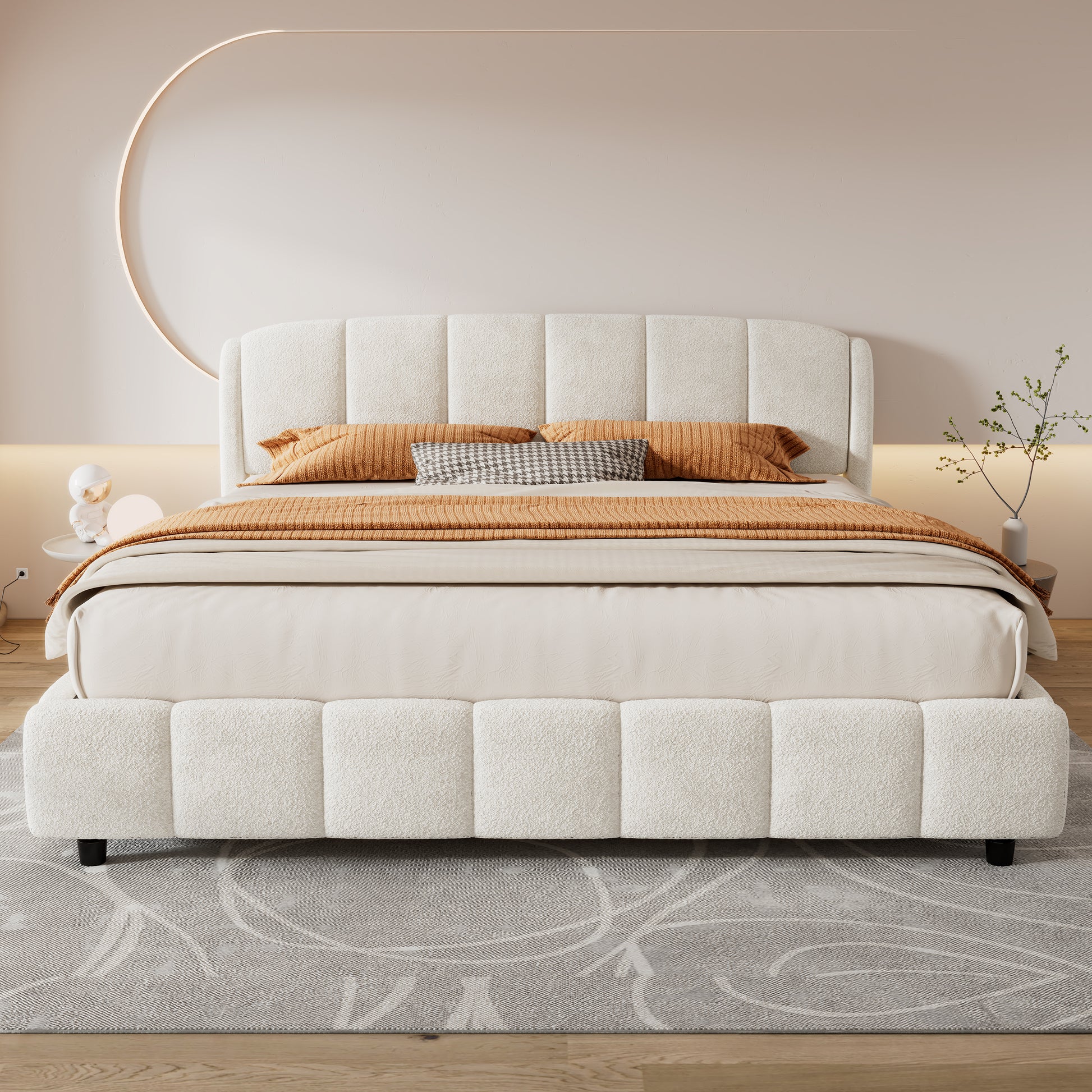 Front view of beige bouclé king platform bed with curved headboard