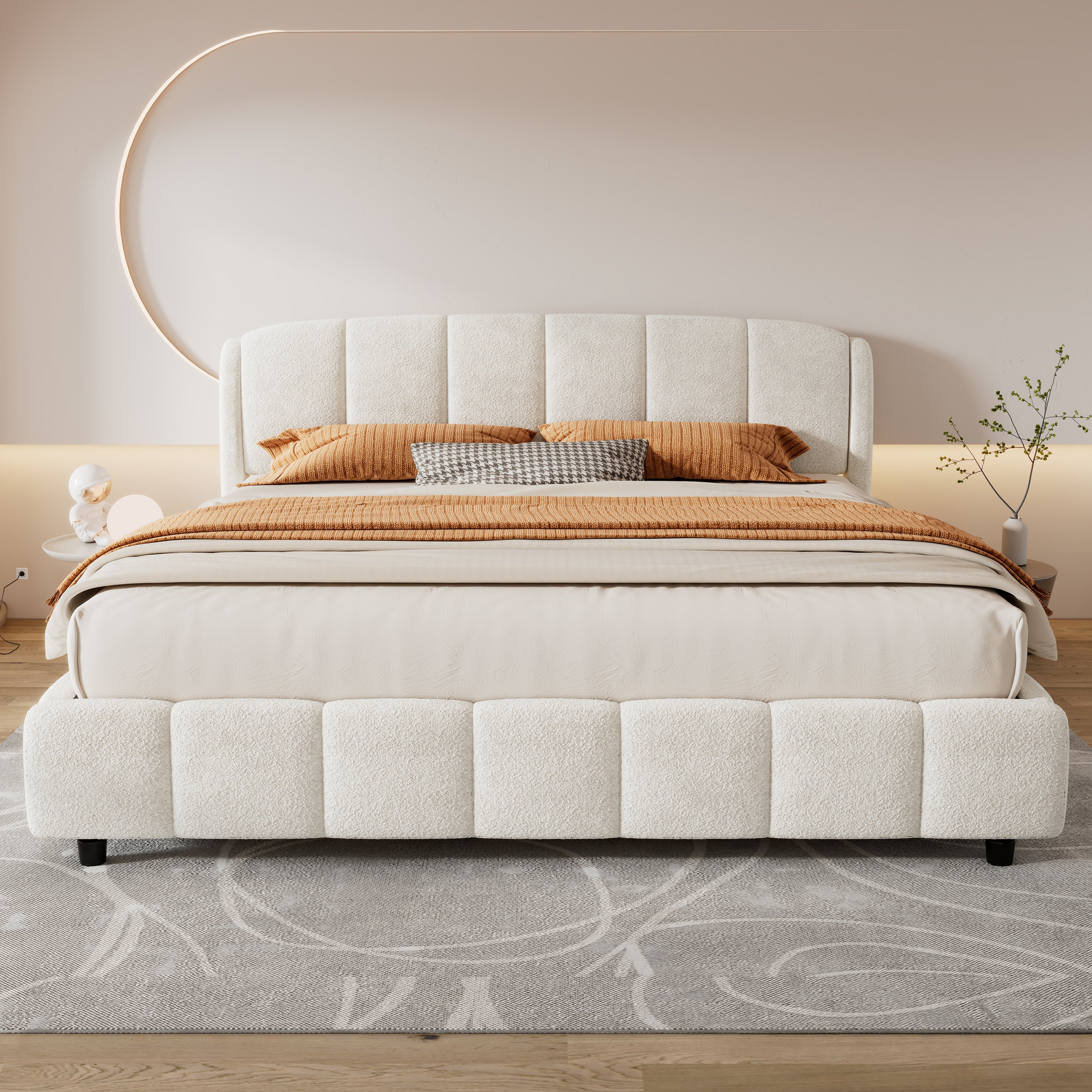 Front view of beige bouclé king platform bed with curved headboard