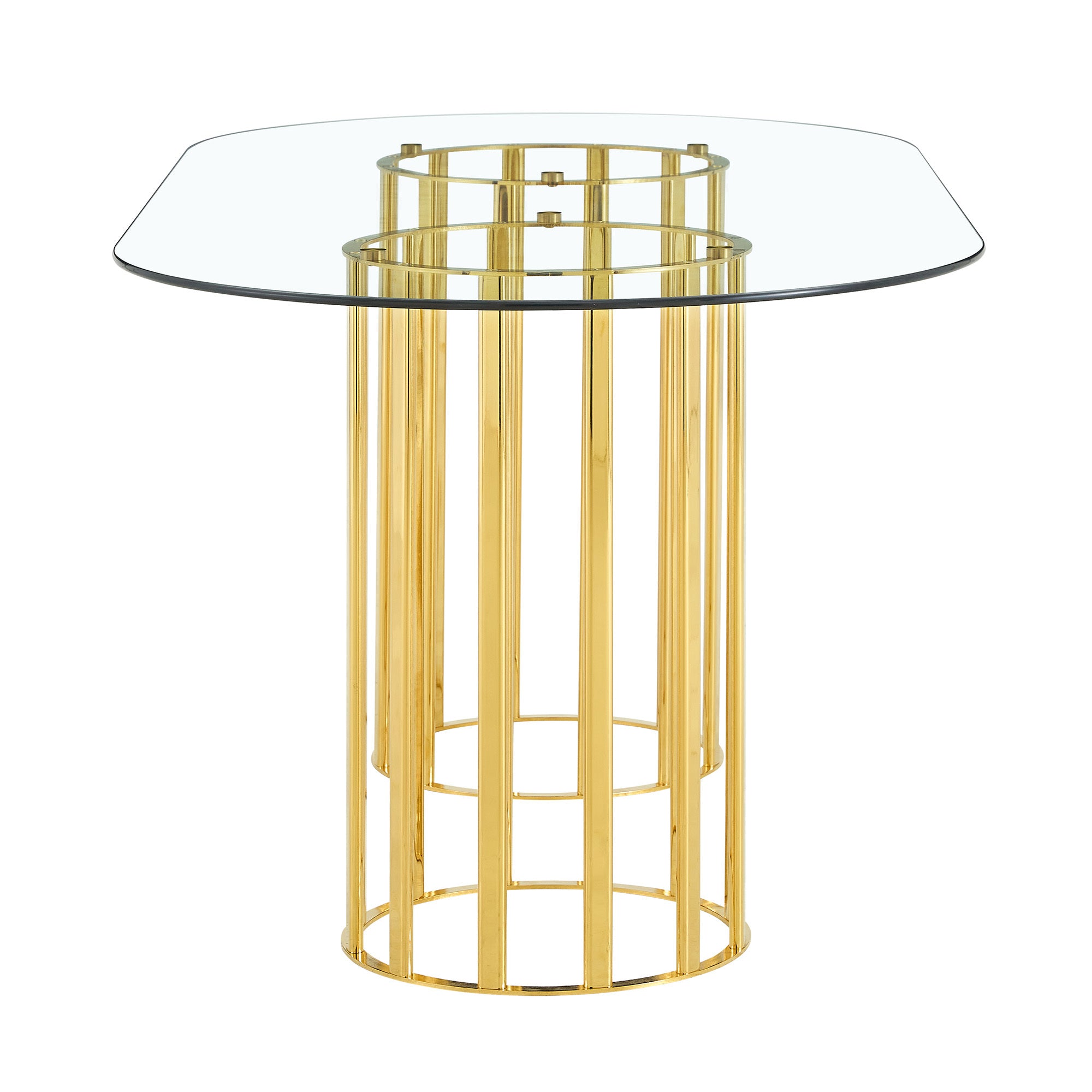 Three-quarter studio view of oval glass dining table with gold double-column pedestal base on white