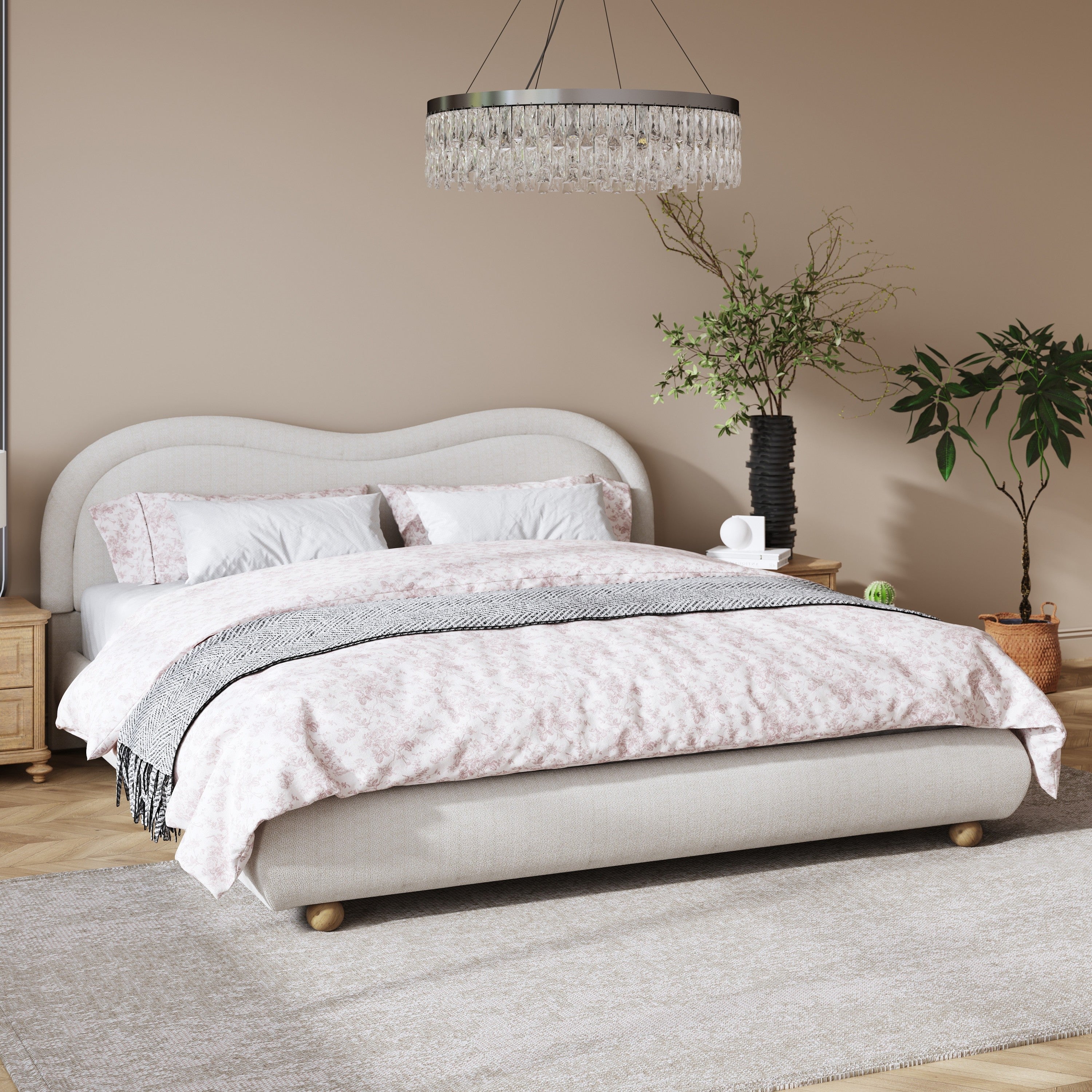 Beige king bed frame in a brick-wall bedroom with green floral bedding, front view