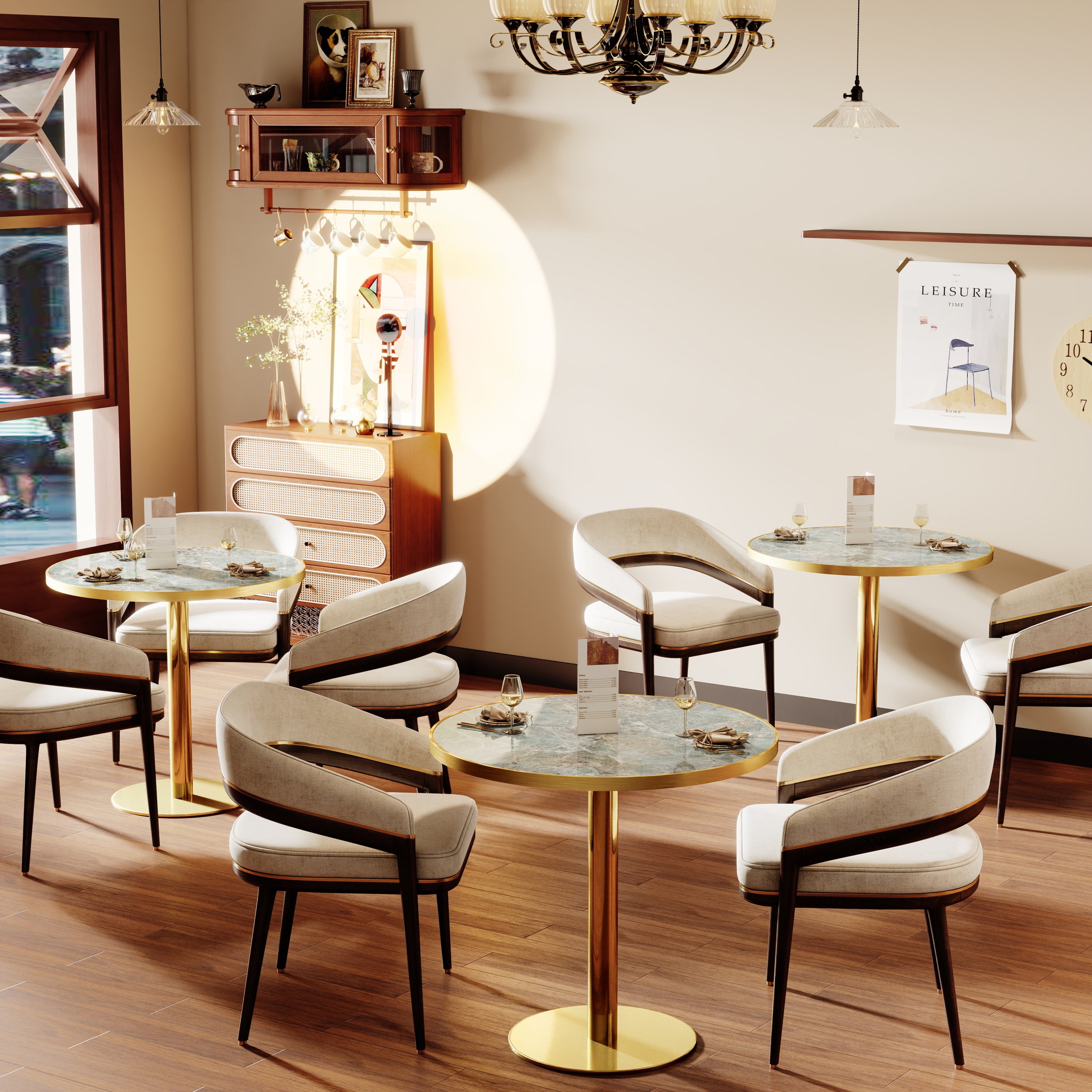 Green stone round tables with gold bases in a styled cafe with cream armchairs