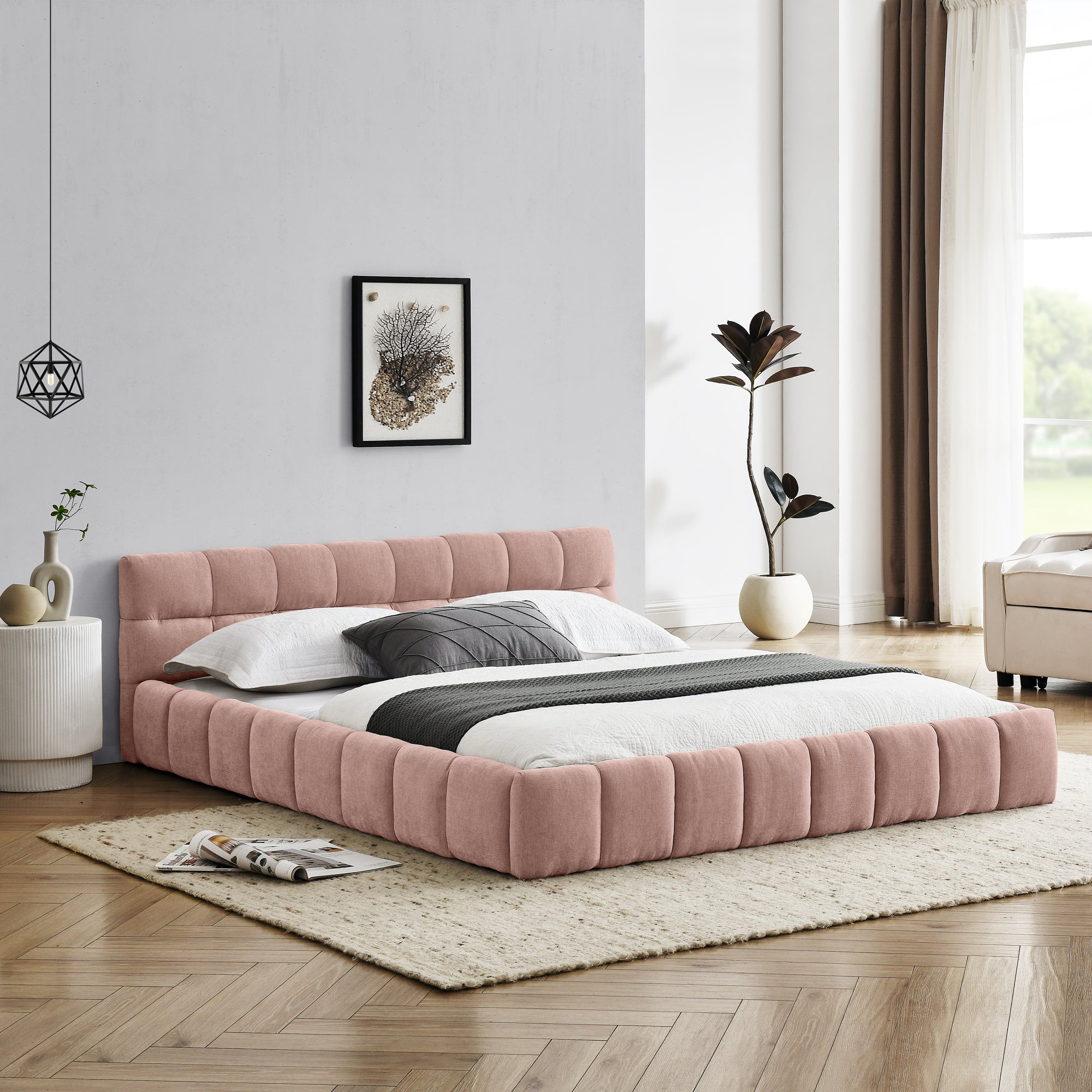 Angled view of the pink chenille low profile queen platform bed, chunky tufted rails, dressed bed #Color_Pink