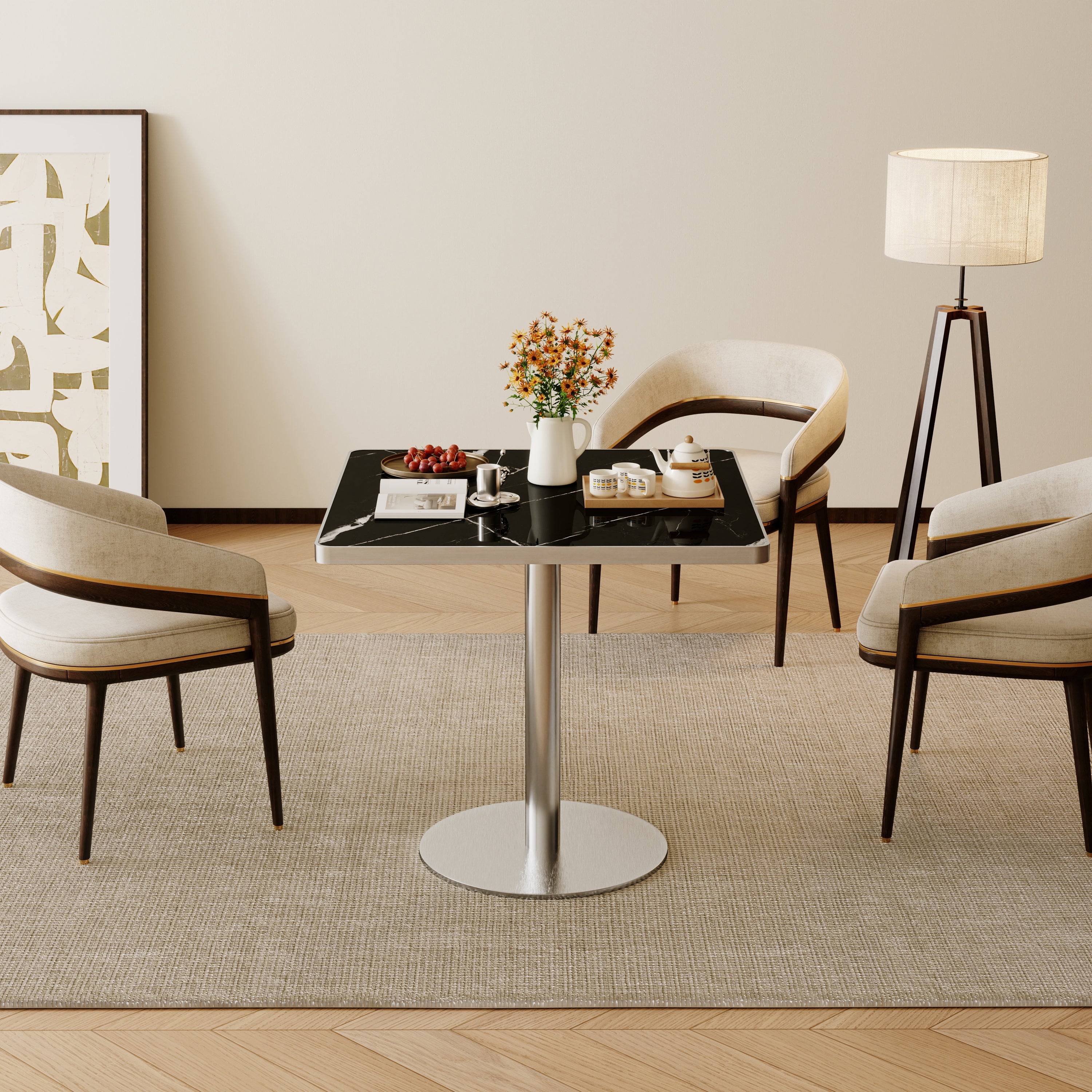 Black sintered stone square dining table in styled living room with cream chairs and floor lamp