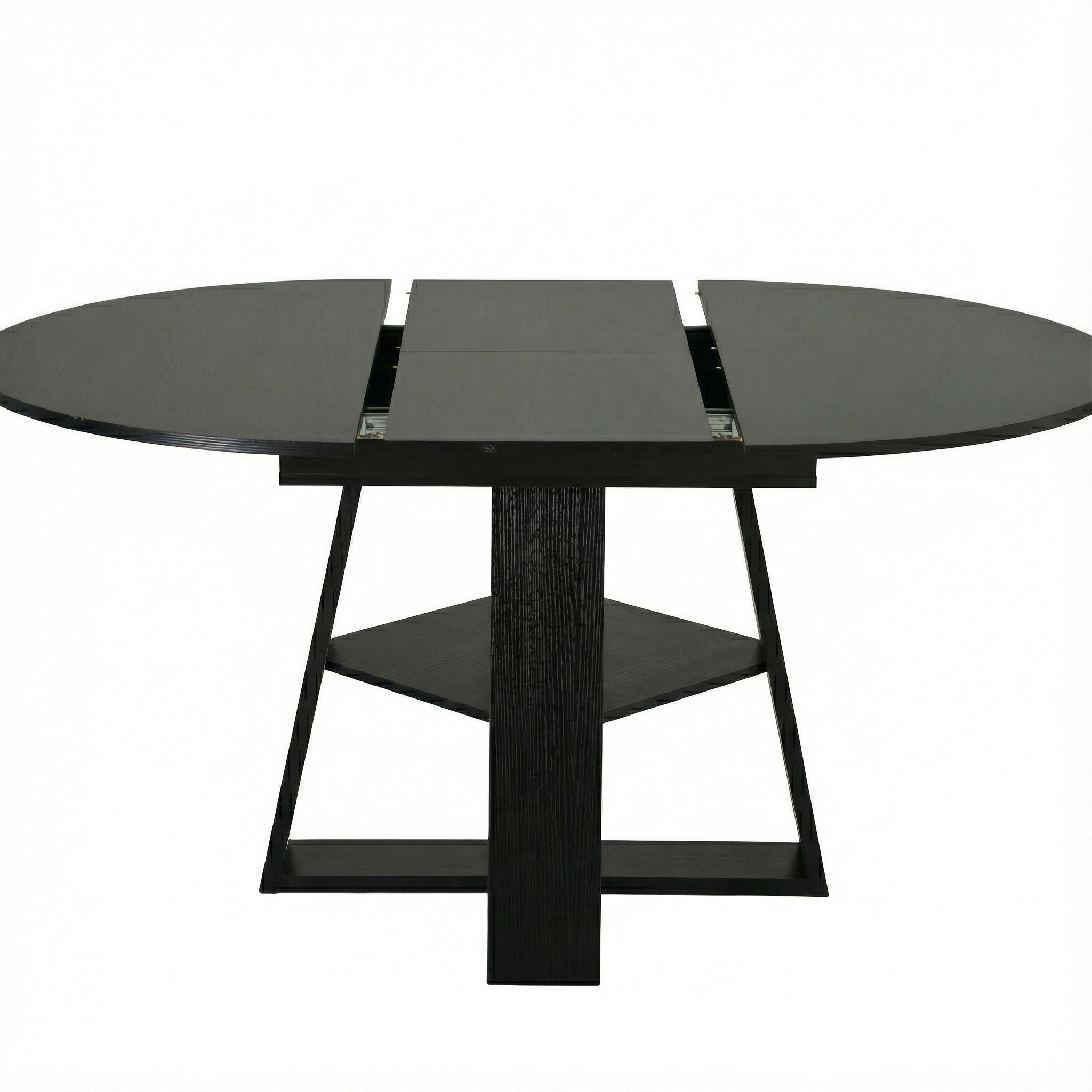 Overhead studio view of the black table opened with the extension gap in the middle