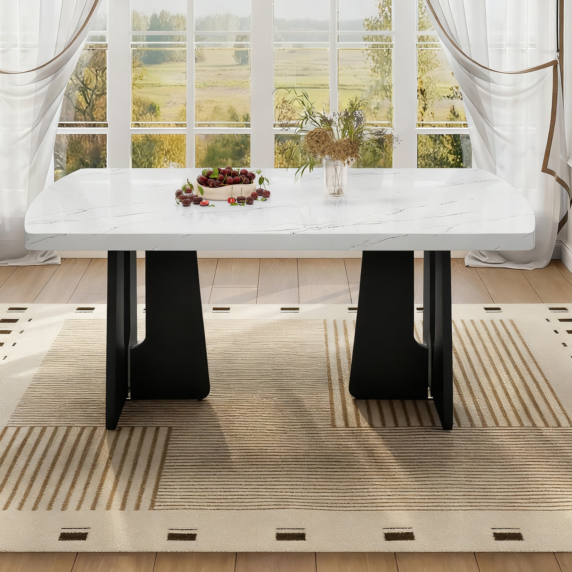 White faux marble dining table with black legs staged by a window in a sunlit dining room