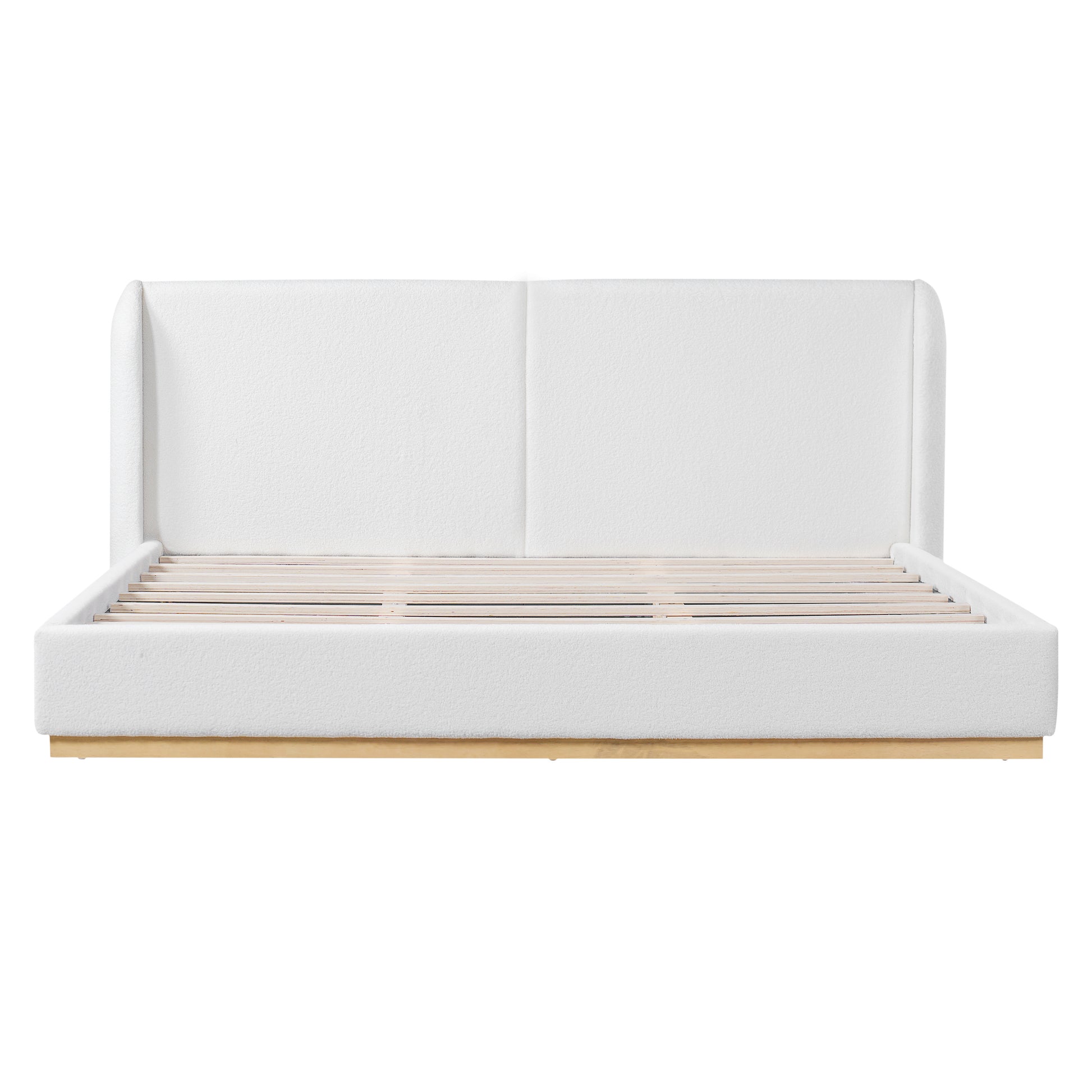 White bouclé king bed frame styled in a bedroom with abstract wall art
