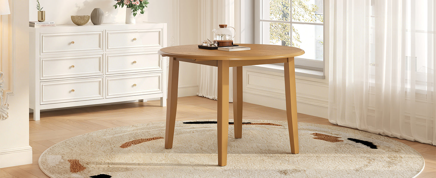 Styled room with the round light brown table and a floor lamp