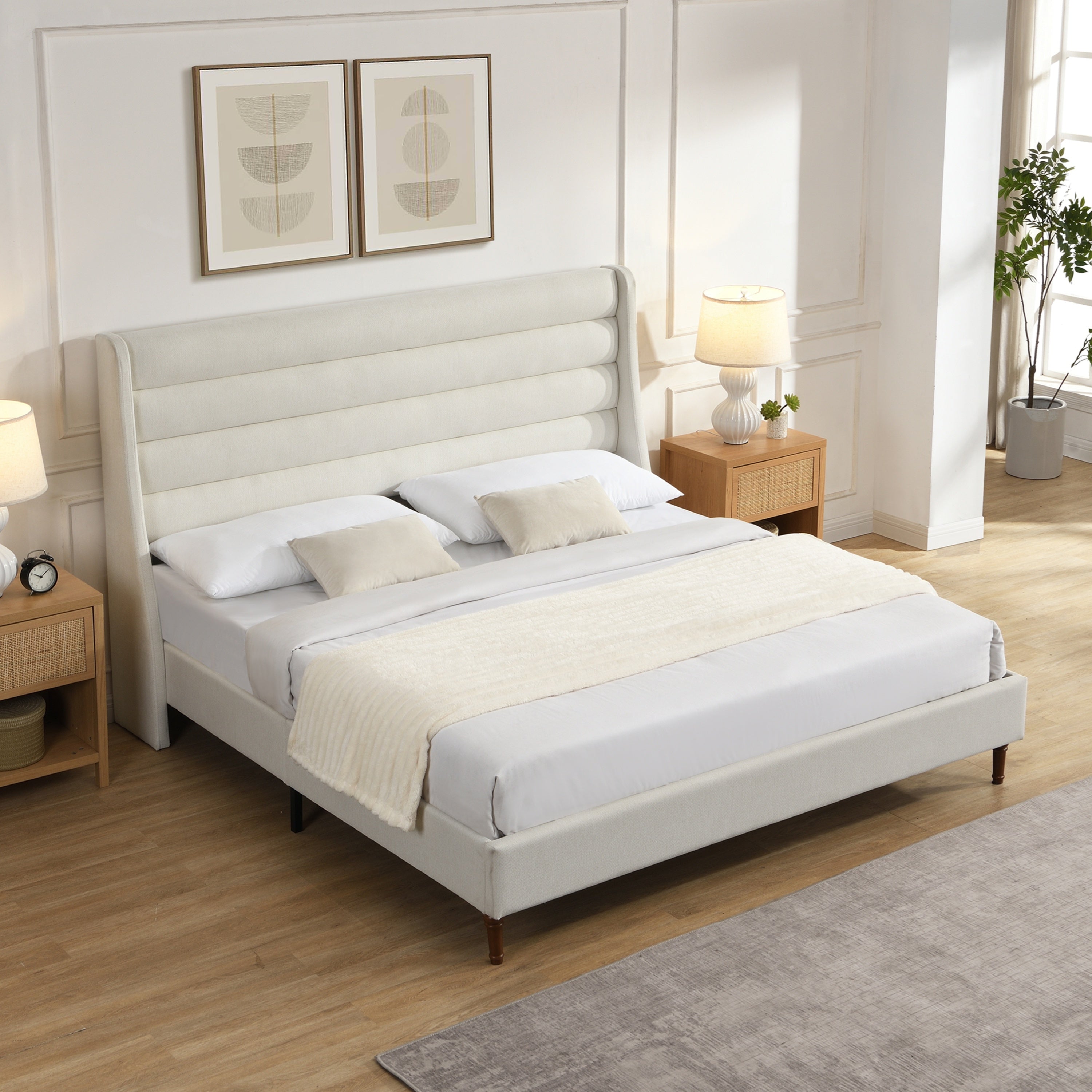 Bare bed frame on white background showing wood slat base