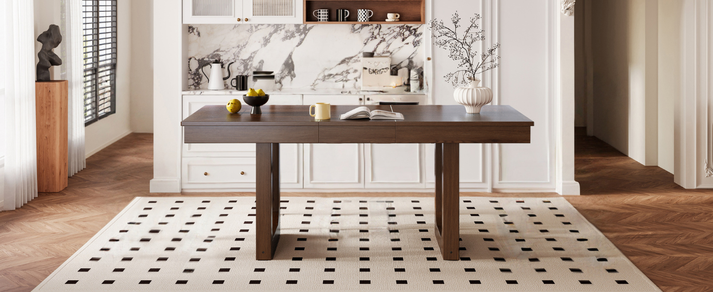 Wide front room view of the walnut farmhouse dining table in a styled kitchen