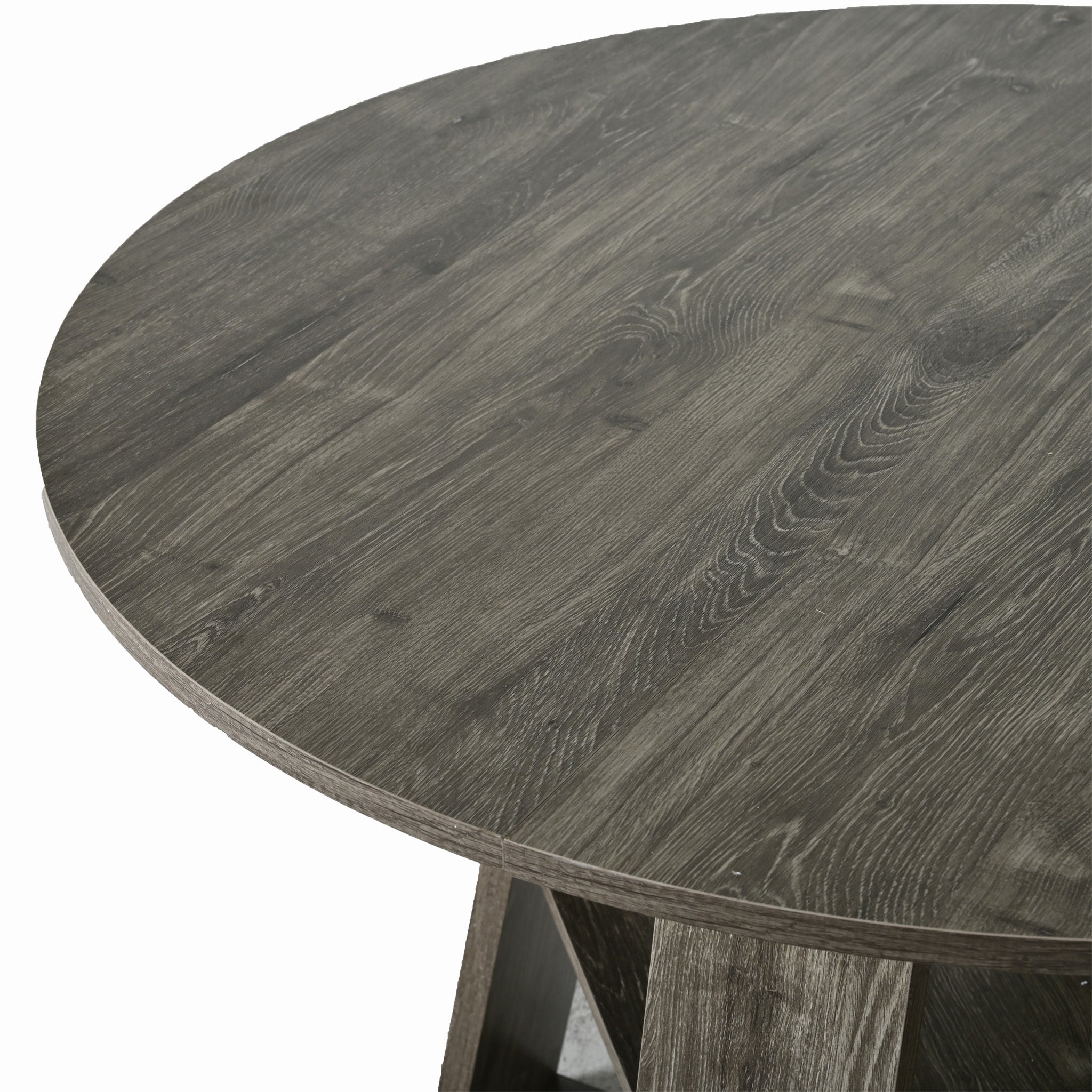 Angled close-up of the gray round tabletop edge
