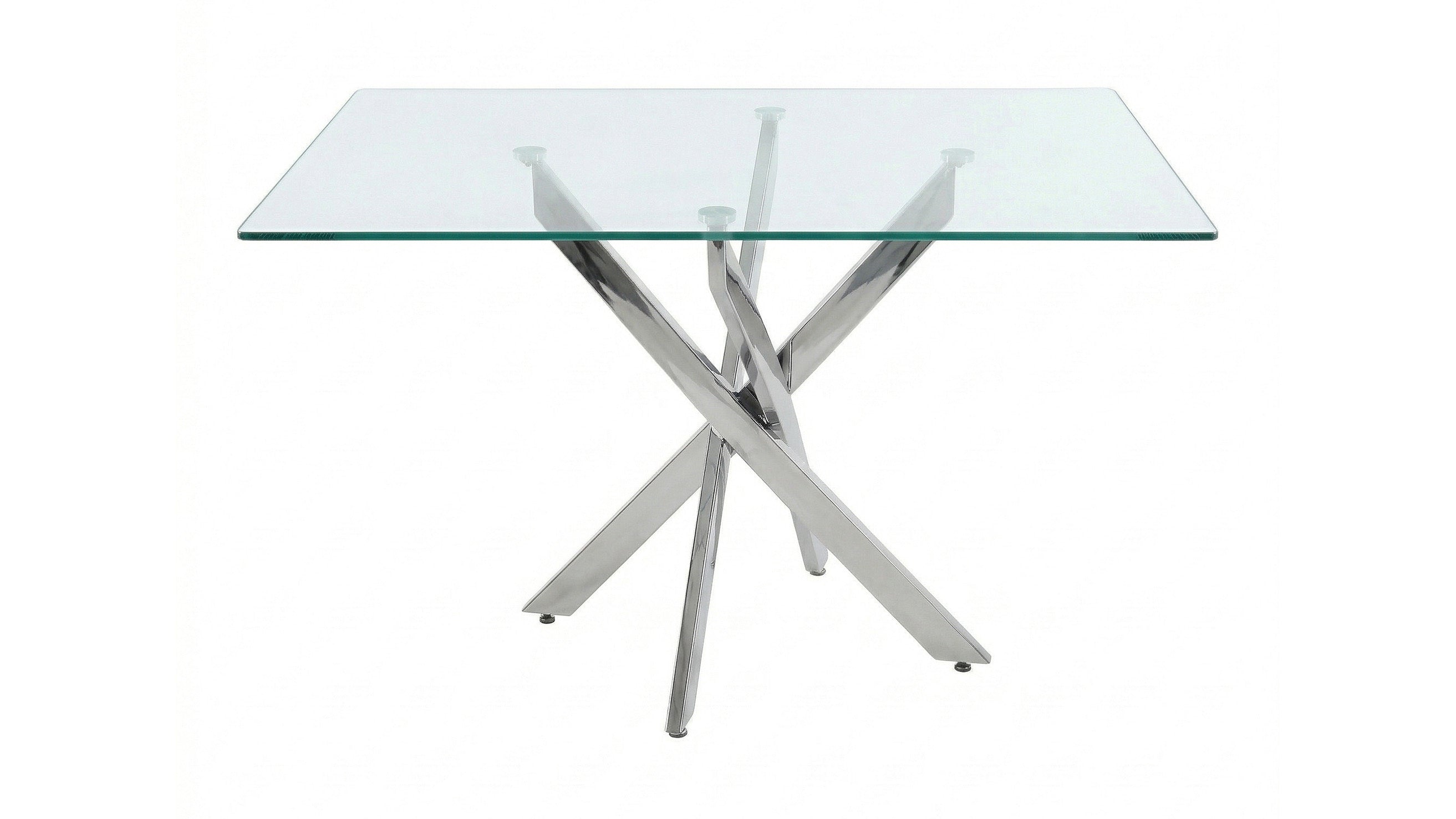 Wide angled studio view of the glass dining table with silver crisscross legs