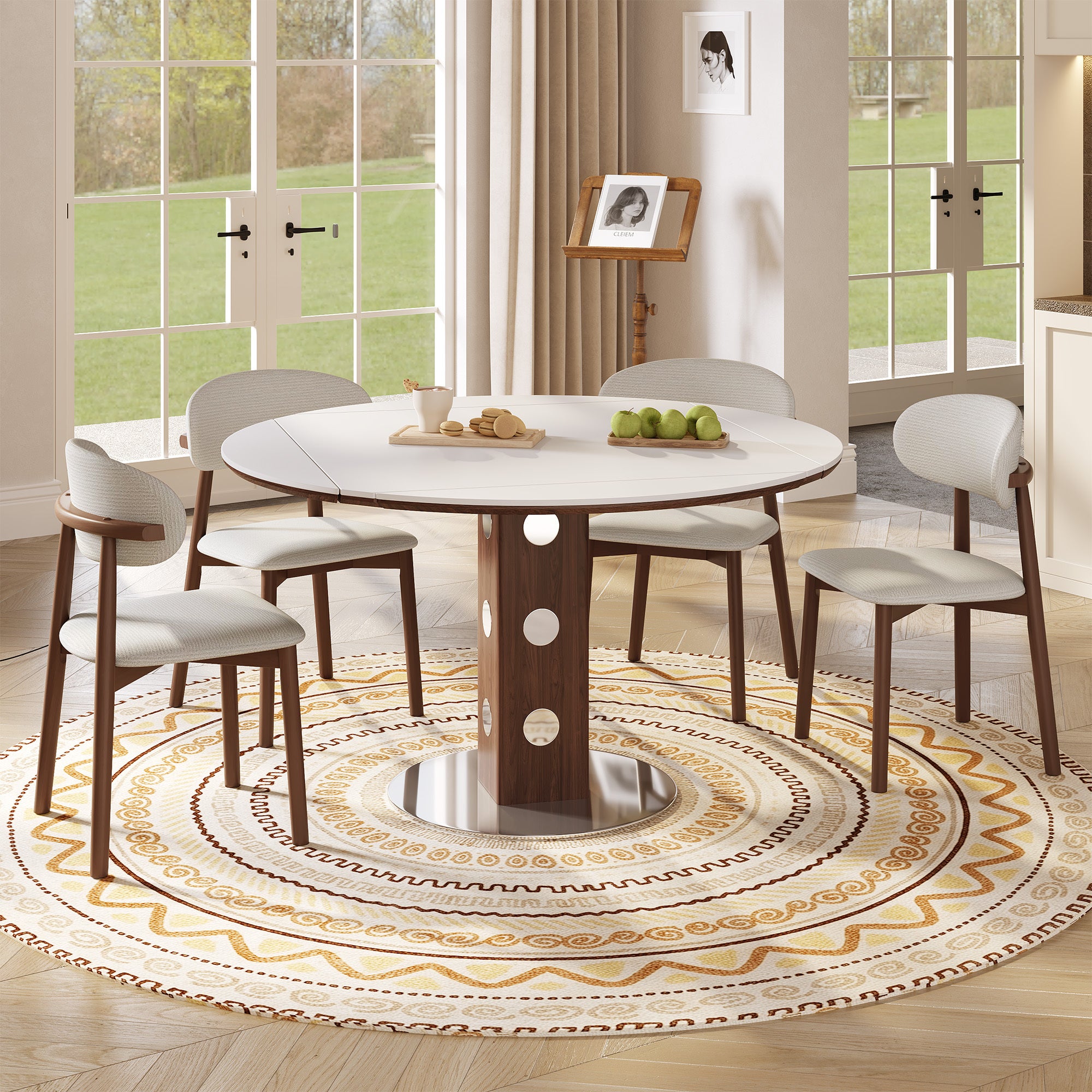 Overhead styled view of the round white table with cream chairs beside a music stand