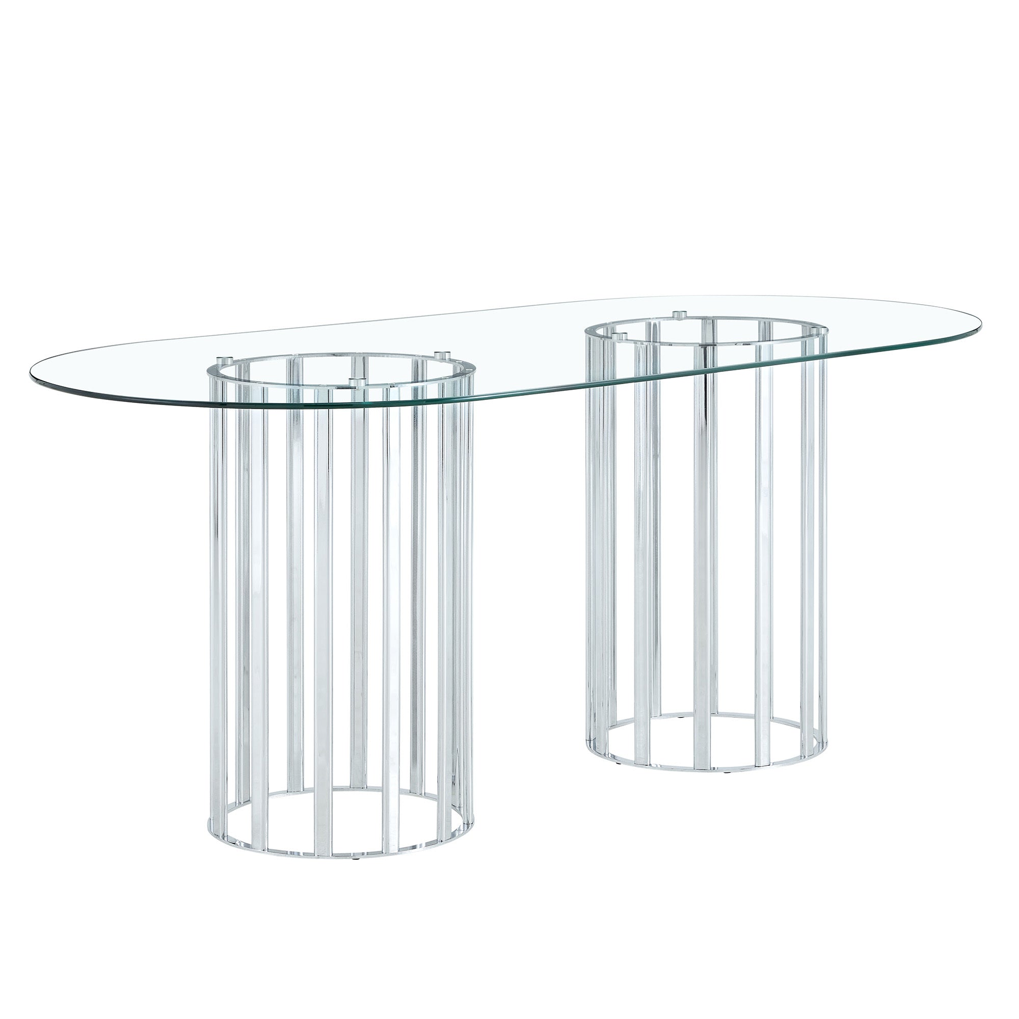 Three-quarter studio view of the oval glass dining table with two silver column pedestals.