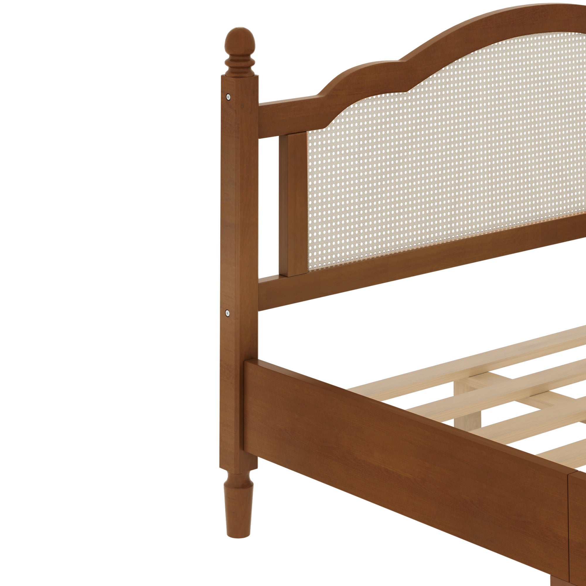 Close-up of arched cane headboard panel on walnut king bed frame