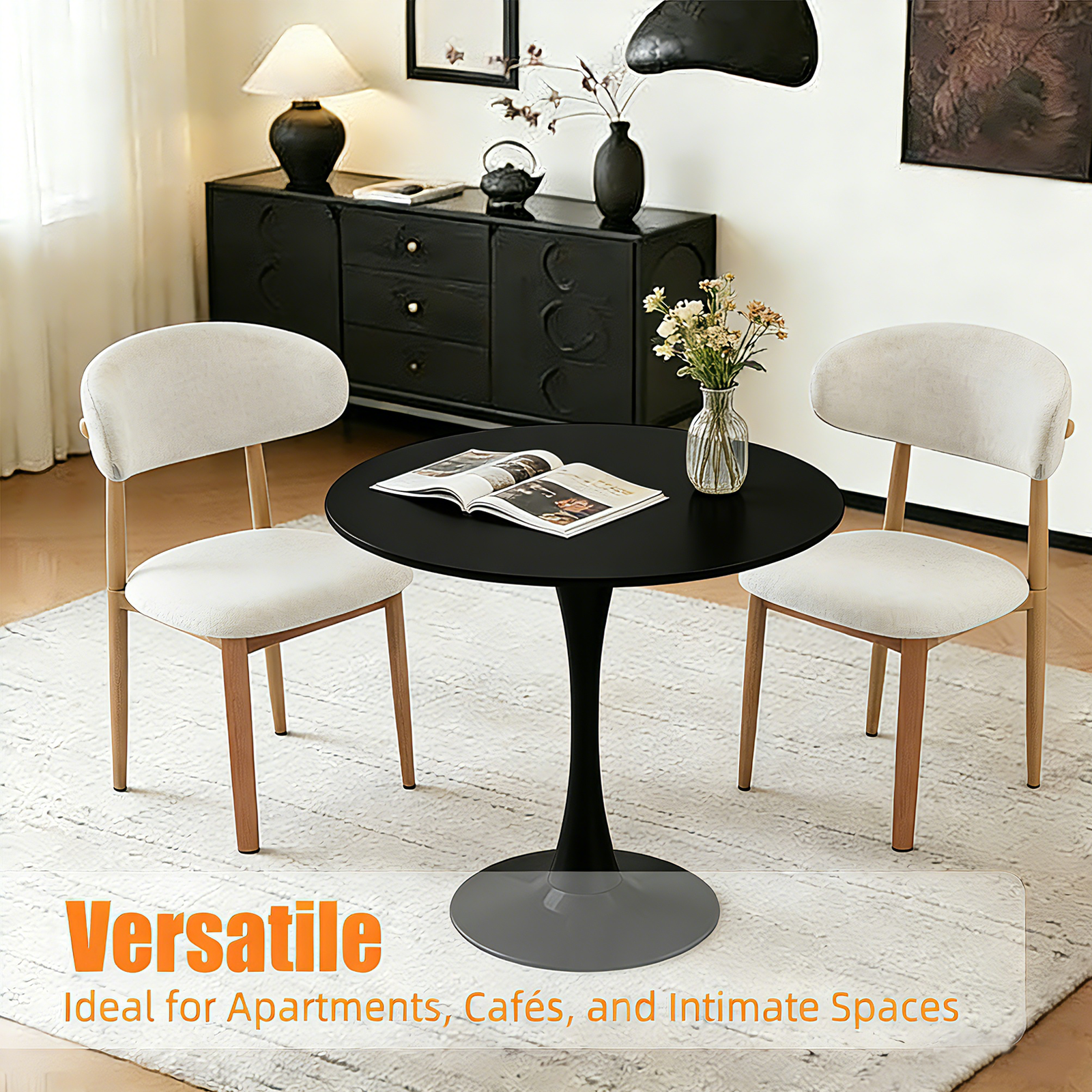 Feature graphic pairing the black round dining table with two boucle dining chairs