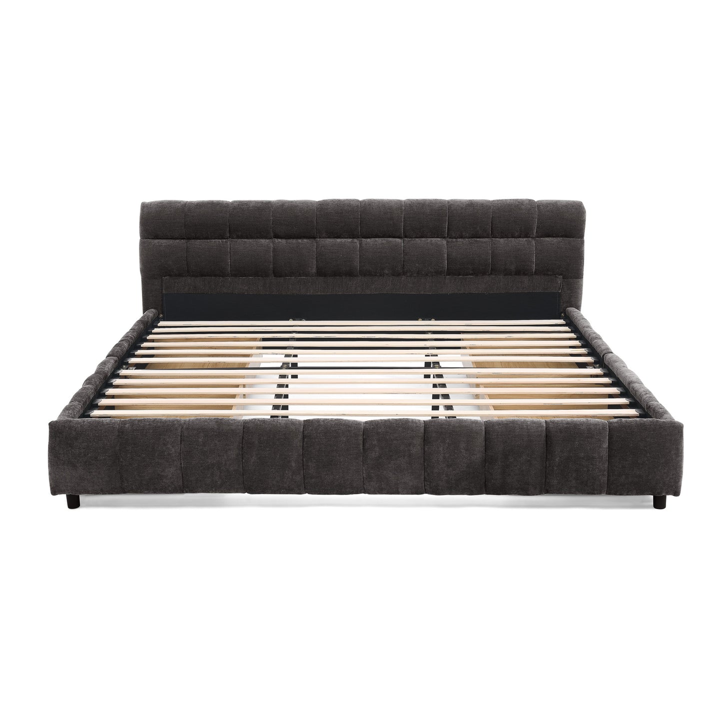 Storage drawer removed from dark gray king bed frame, empty interior