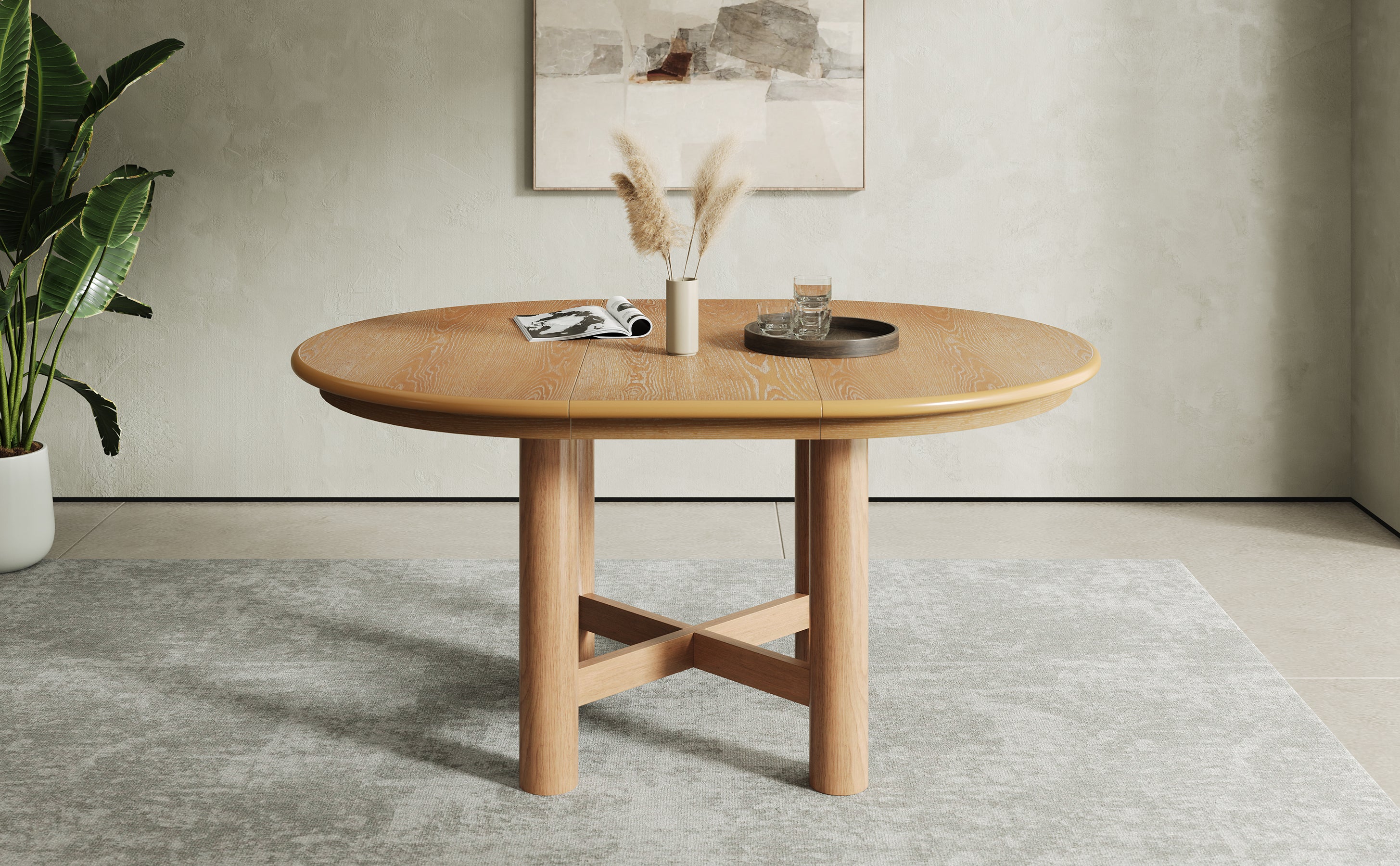 Angled studio detail of the extended oval oak-veneer tabletop and legs