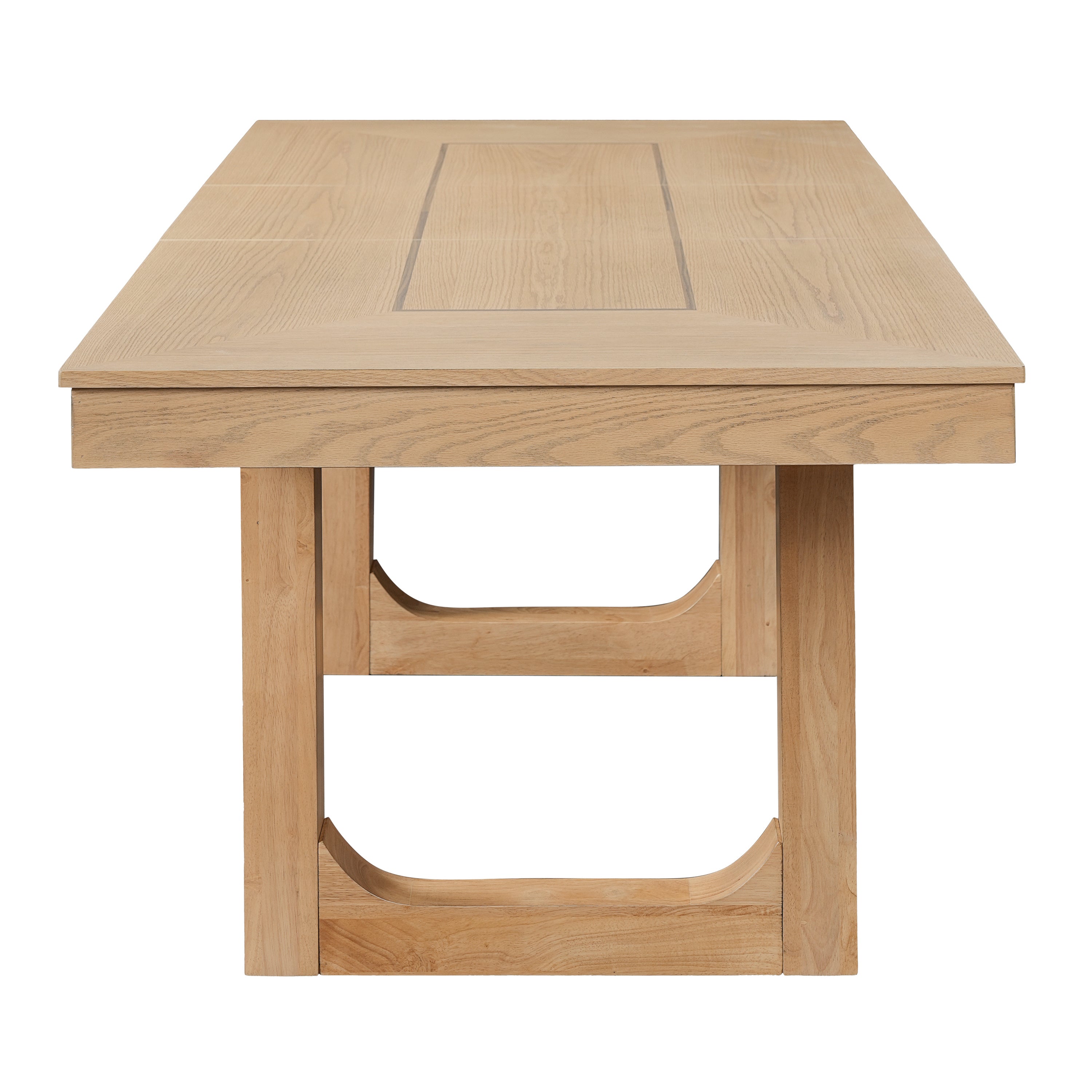 End view of the natural oak farmhouse dining table showing the trestle-style legs on white