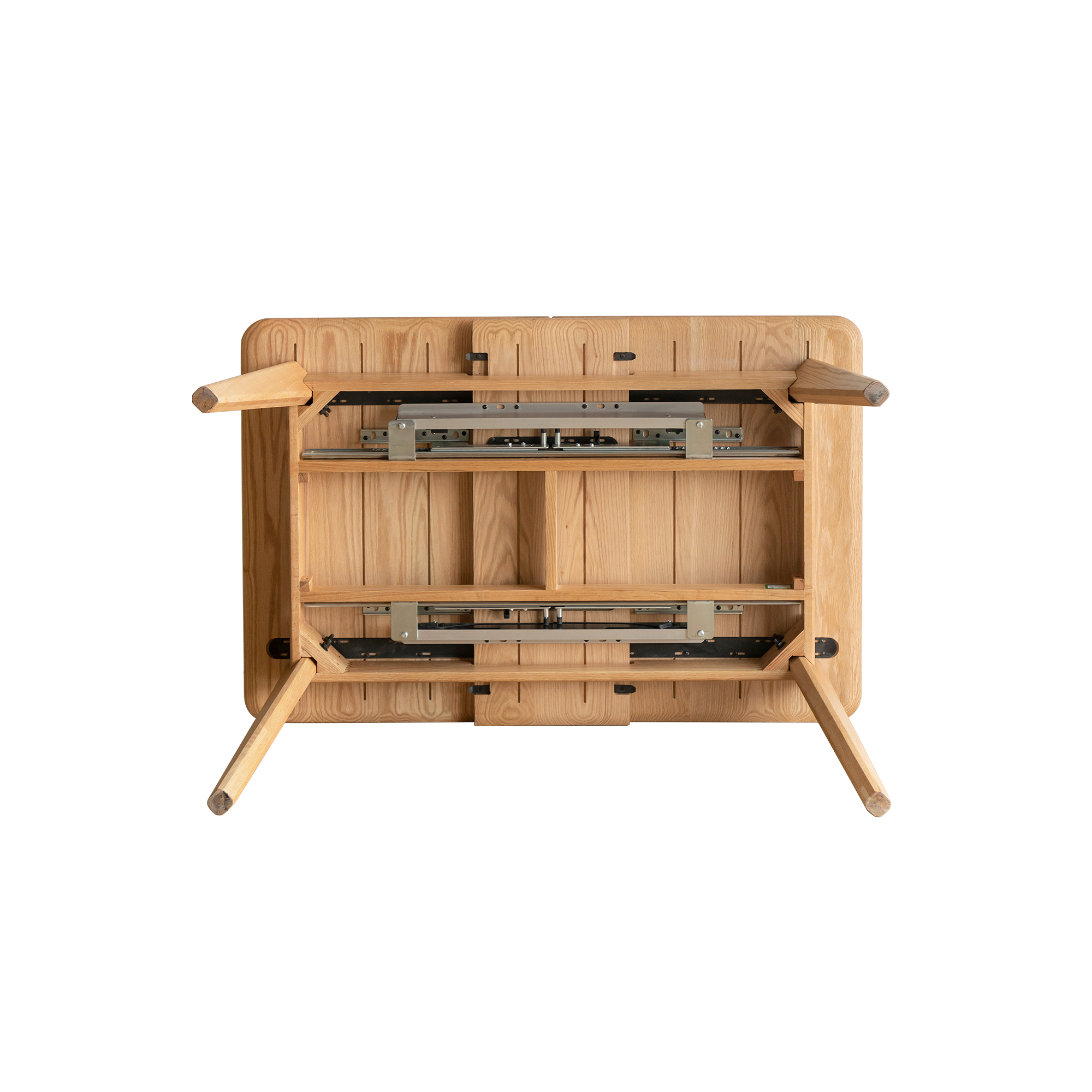 Underside of the natural oak table showing the metal extension slide rails and hardware