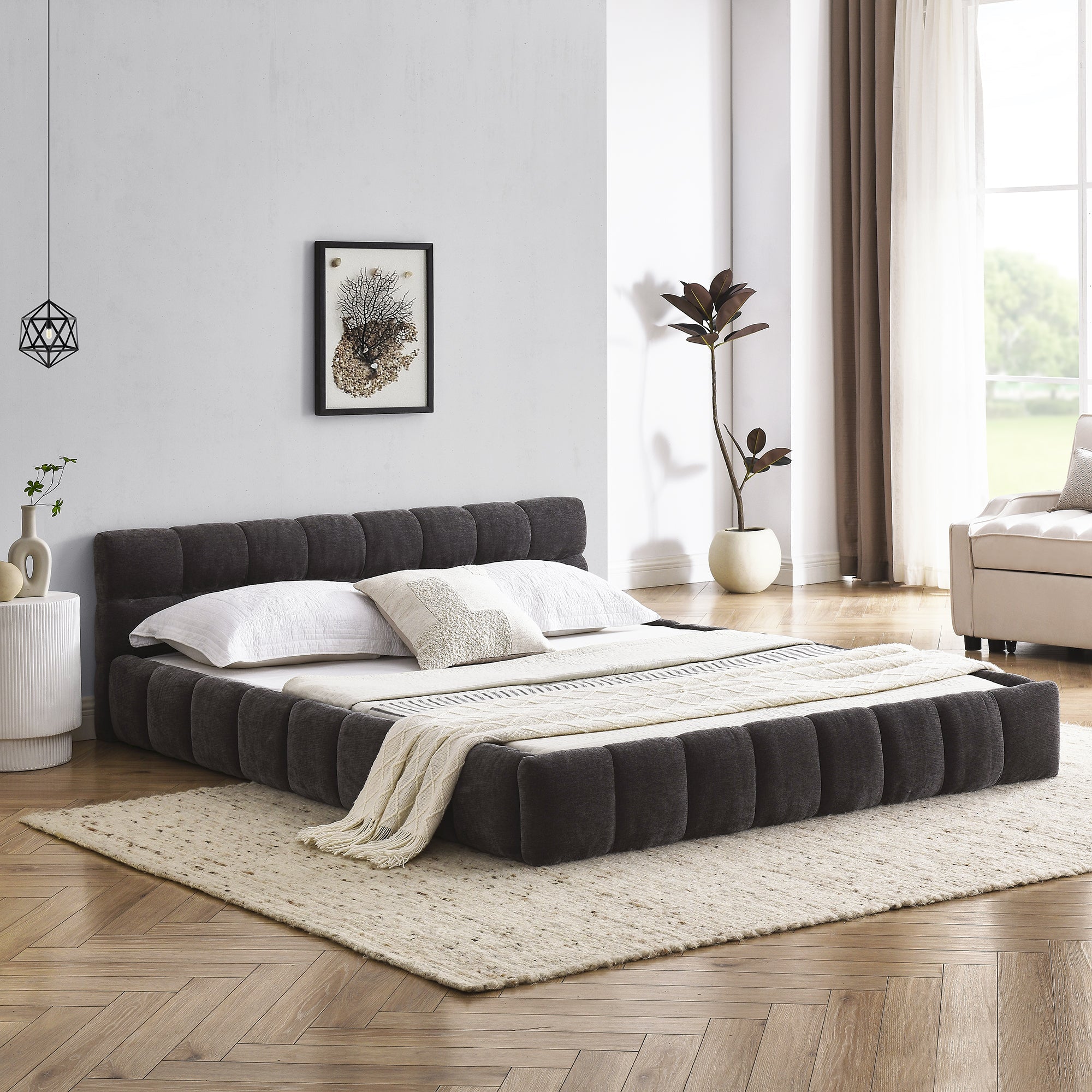 Dark grey chenille channel-tufted platform bed made up in a bedroom, side angle with rug #Color_Dark Grey