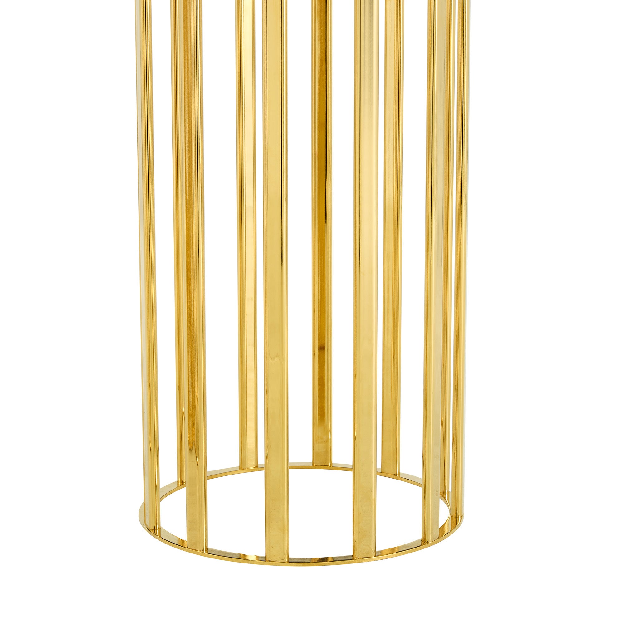 Close-up of the gold slatted column base of the dining table on a plain white background