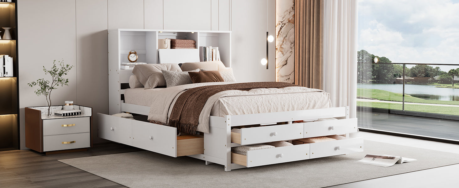 Angled view of the white bookcase-headboard bed with side and footboard drawers open, nightstands alongside