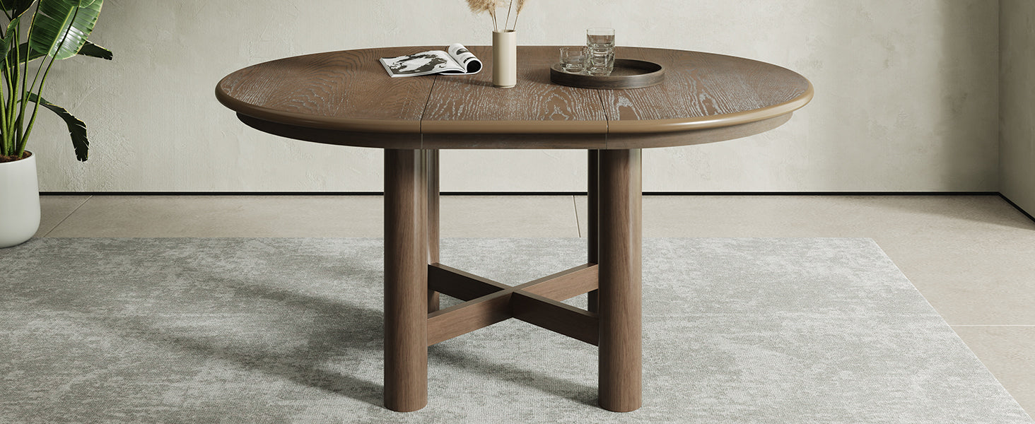 Extended oval espresso oak table with two tan chairs in a bright room