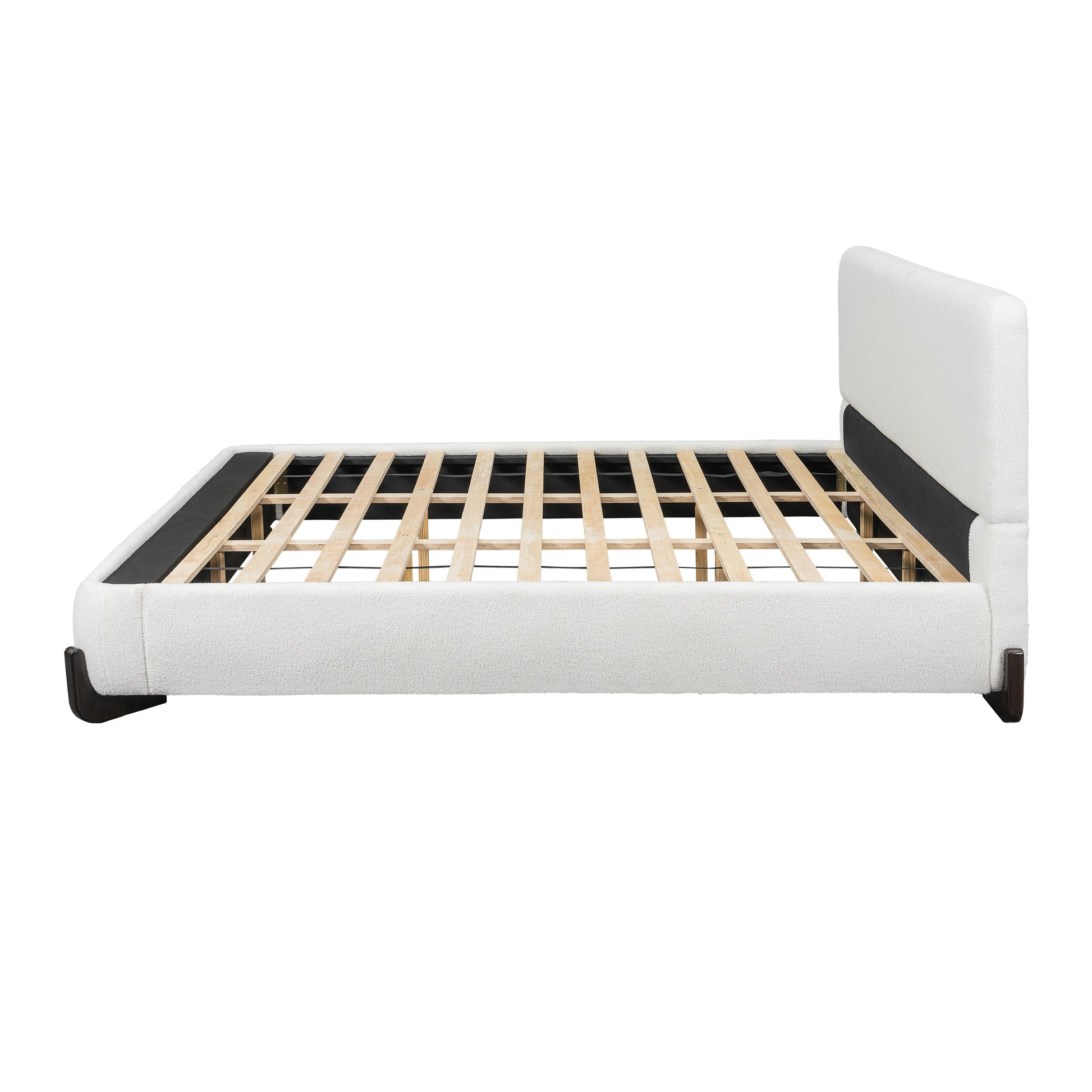 Side profile of white bouclé king bed frame showing headboard height