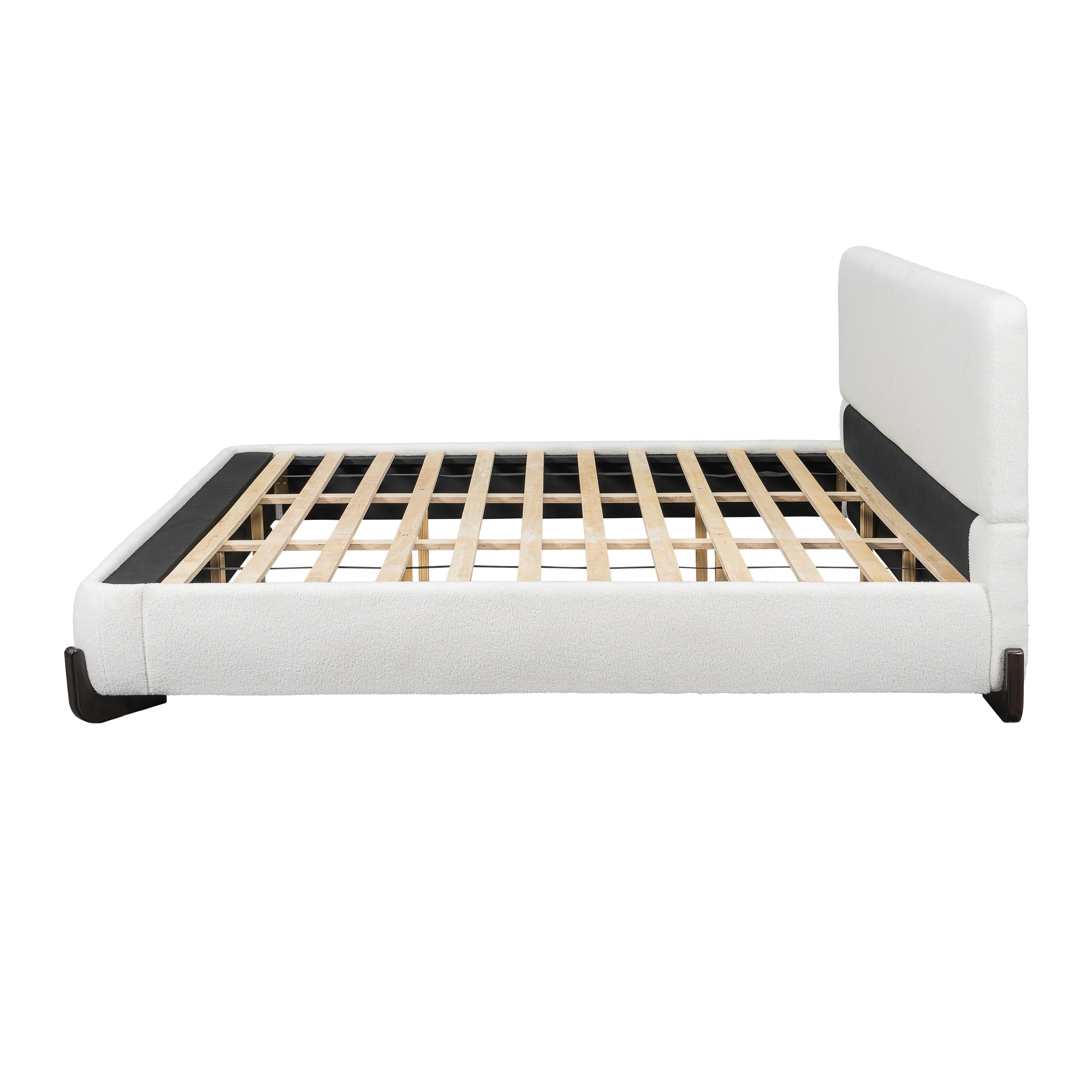 Side profile of white bouclé king bed frame showing headboard height